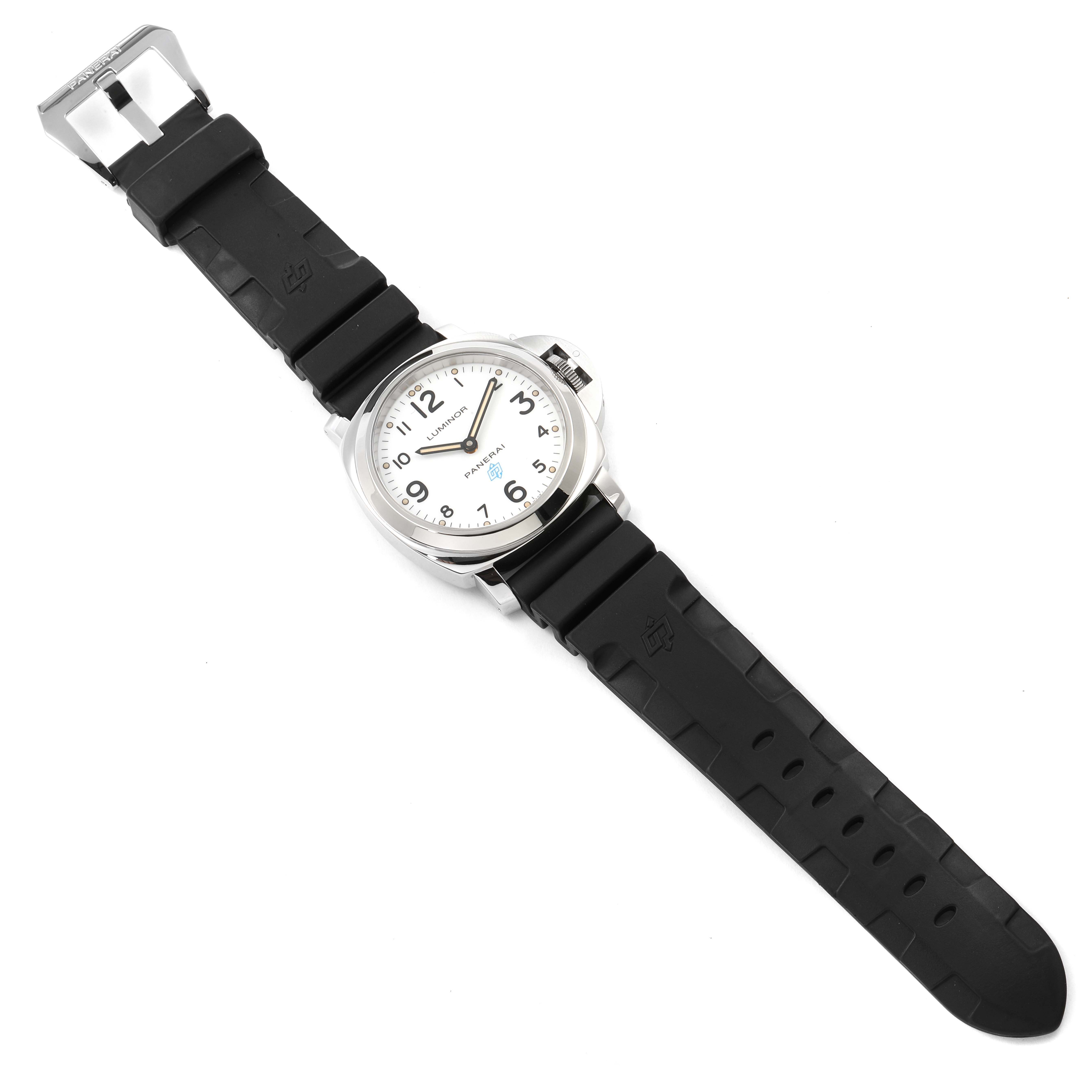 The image shows a top view of a Panerai Luminor PAM00630 Men
s Stainless Steel White Dial PAM00630 Men
s Stainless Steel White Dial watch, featuring its dial, case, and black strap.