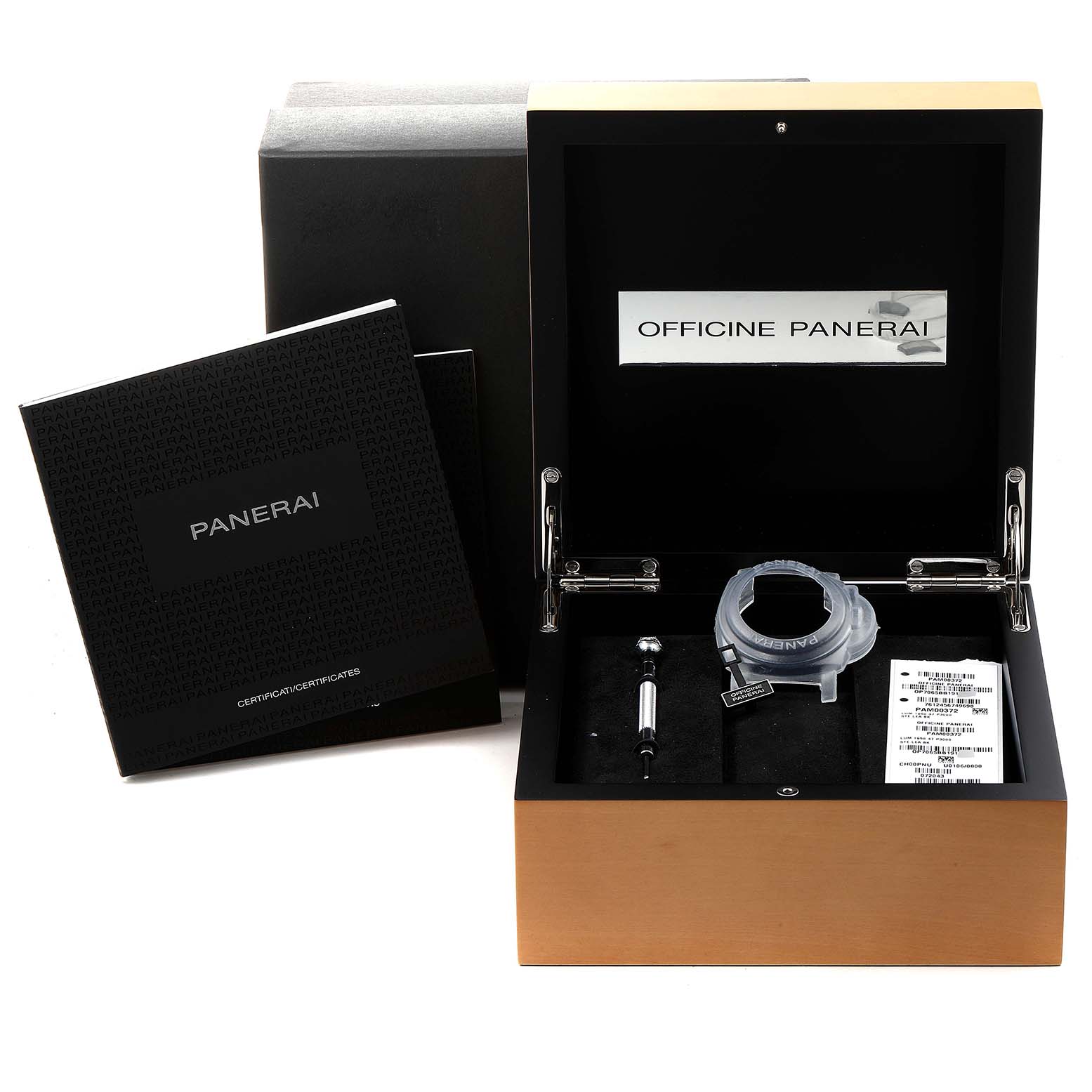The image shows an opened box for the Panerai Luminor PAM00372 Men
s Stainless Steel Black Dial PAM00372 Men
s Stainless Steel Black Dial model, including documentation and tools.