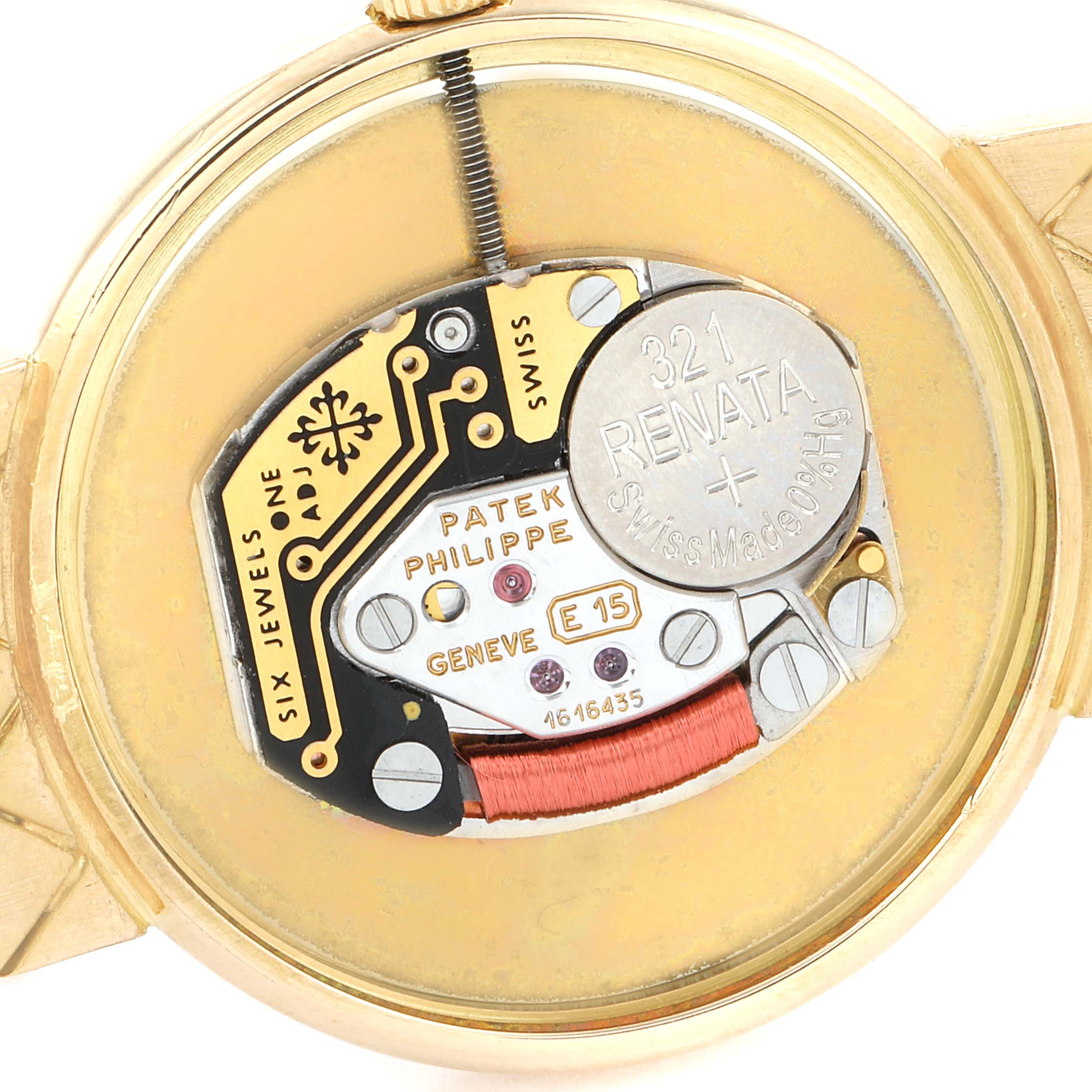 The image shows the movement mechanism and battery of a Patek Philippe Calatrava 4821 Women's Yellow Gold White Dial 4821 Women's Yellow Gold White Dial watch from the back view.