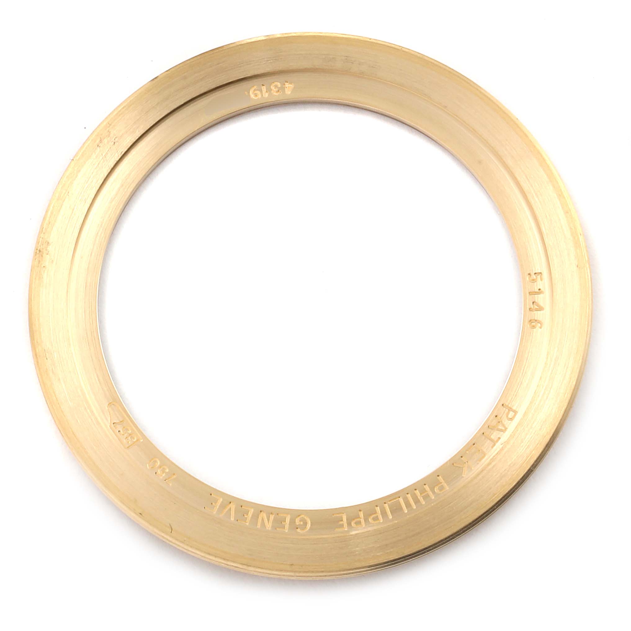 This image shows the bezel of a Patek Philippe 5146J - 01D Men
s Yellow Gold Grey Dial 5146J - 01D Men
s Yellow Gold Grey Dial Complicated Annual Calendar Yellow Gold Mens Watch 5146, viewed from above.