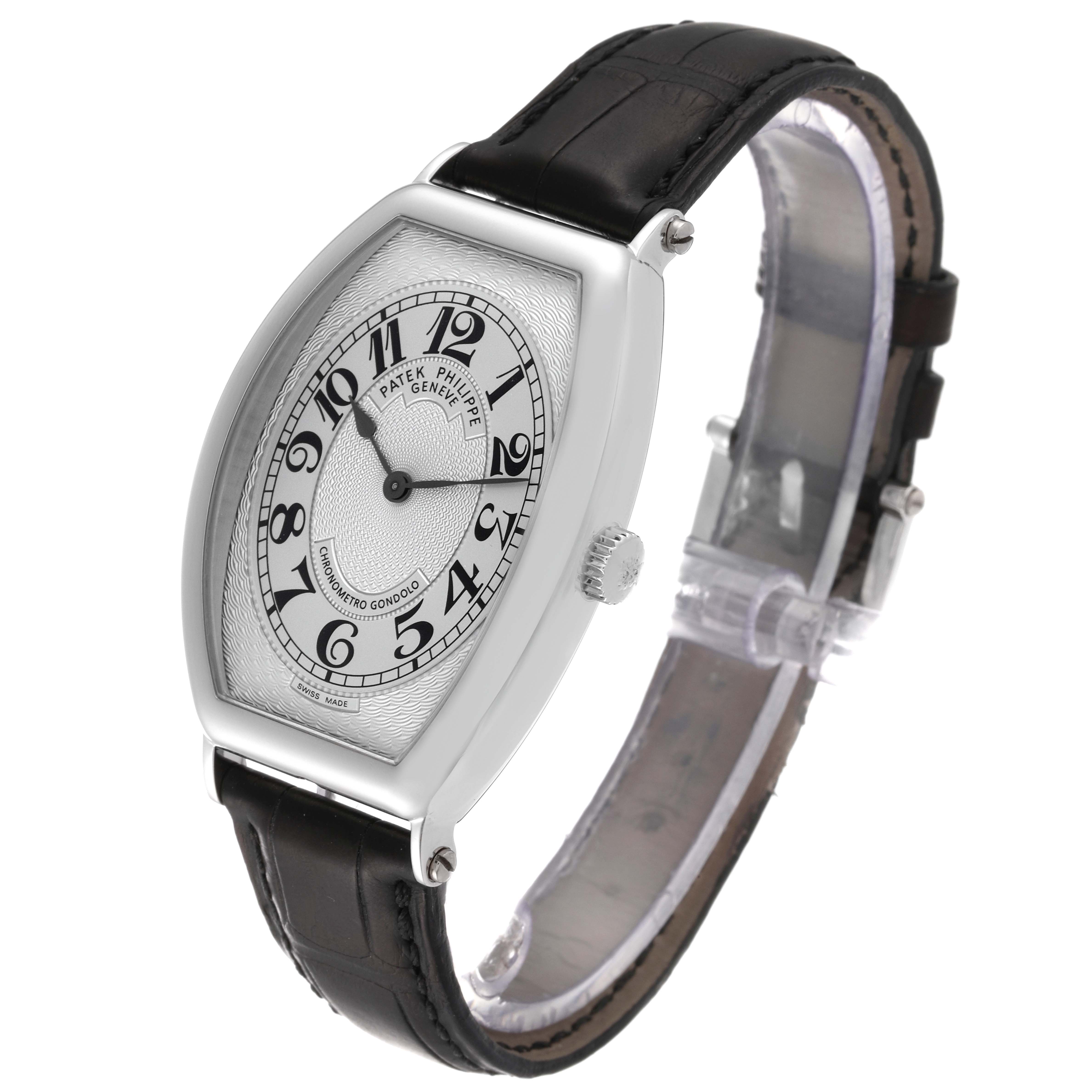 The Patek Philippe Gondolo 5098P Men's Platinum Silver Dial 5098P Men's Platinum Silver Dial watch is shown at a three-quarter angle, displaying the dial, case, crown, and leather strap.