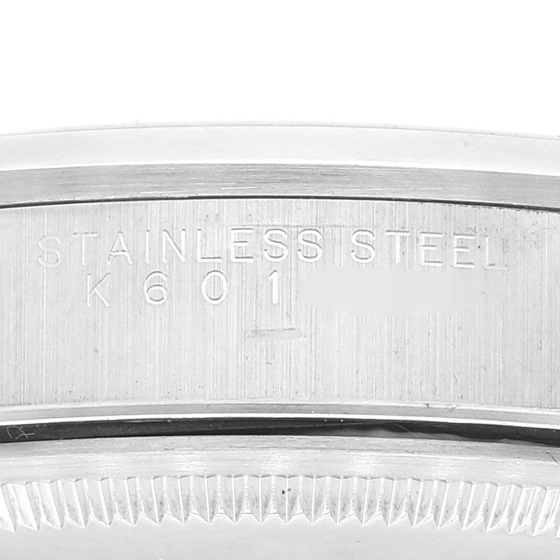 The image shows a close-up of the stainless steel bezel engraving on a Rolex Air-King 14000 Men's Stainless Steel Blue Dial 14000 Men's Stainless Steel Blue Dial watch.