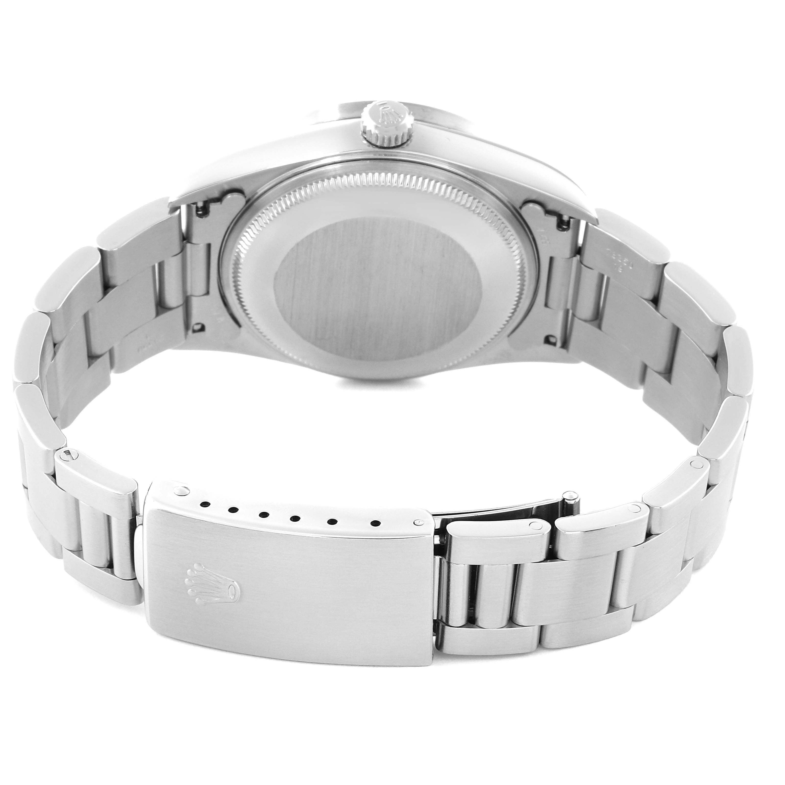 The image shows the back view of a Rolex Air-King 14010 Men's Stainless Steel Blue Dial 14010 Men's Stainless Steel Blue Dial watch, highlighting its case back and stainless steel bracelet with the clasp open.