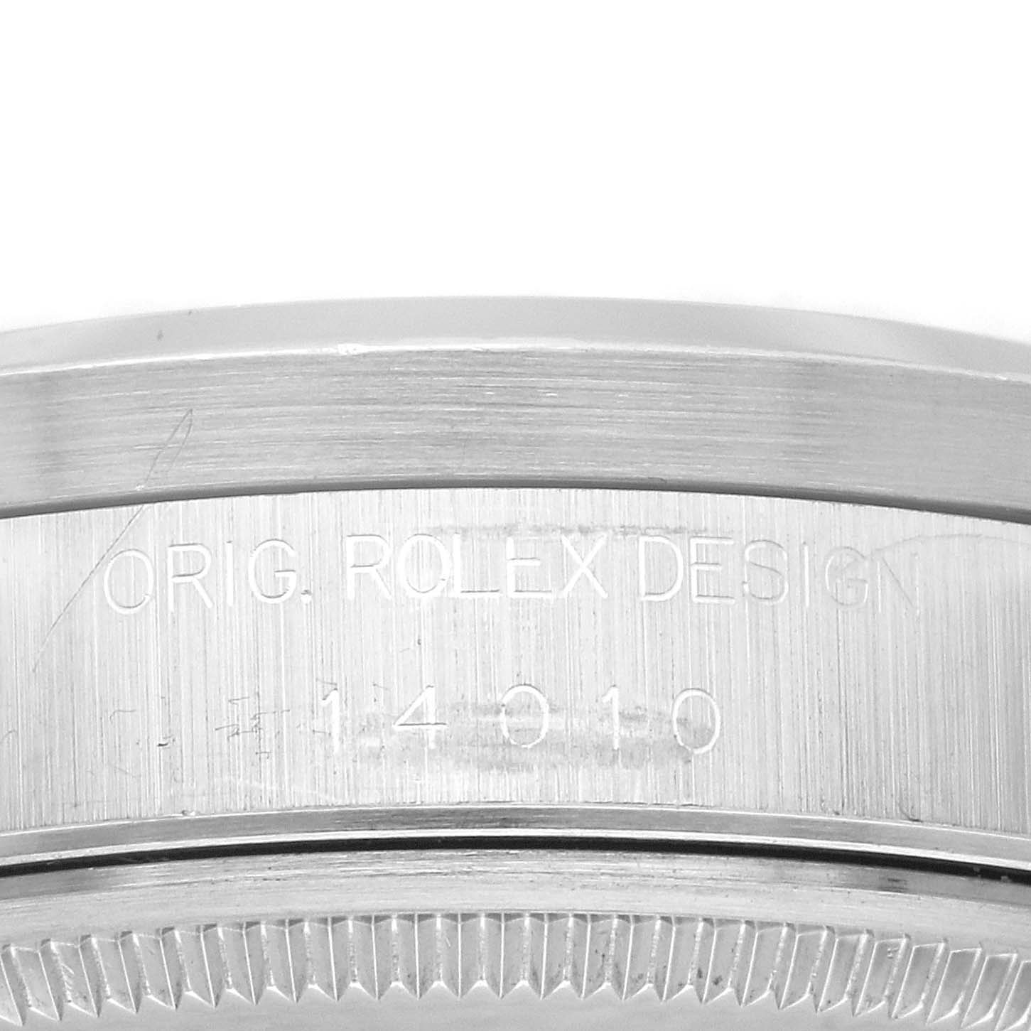 This is a close-up of the side view of the Rolex Air-King 14010 Men's Stainless Steel Blue Dial 14010 Men's Stainless Steel Blue Dial watch, showing its "ORIG. ROLEX DESIGN" engraving and model number.