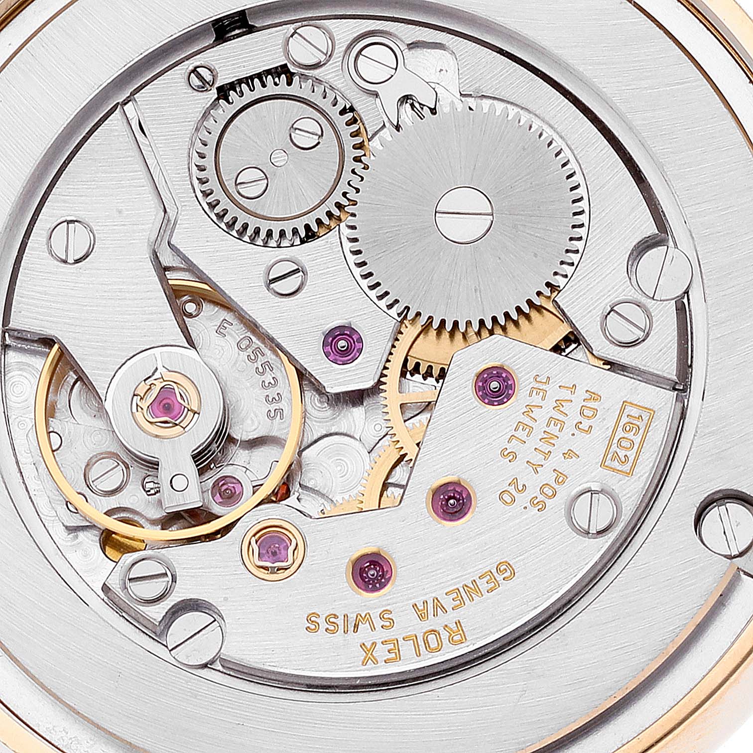 This image shows a close-up of the Rolex Cellini 5115 Men's Yellow Gold Mother of Pearl Dial 5115 Men's Yellow Gold Mother of Pearl Dial watch's internal mechanical movement components.