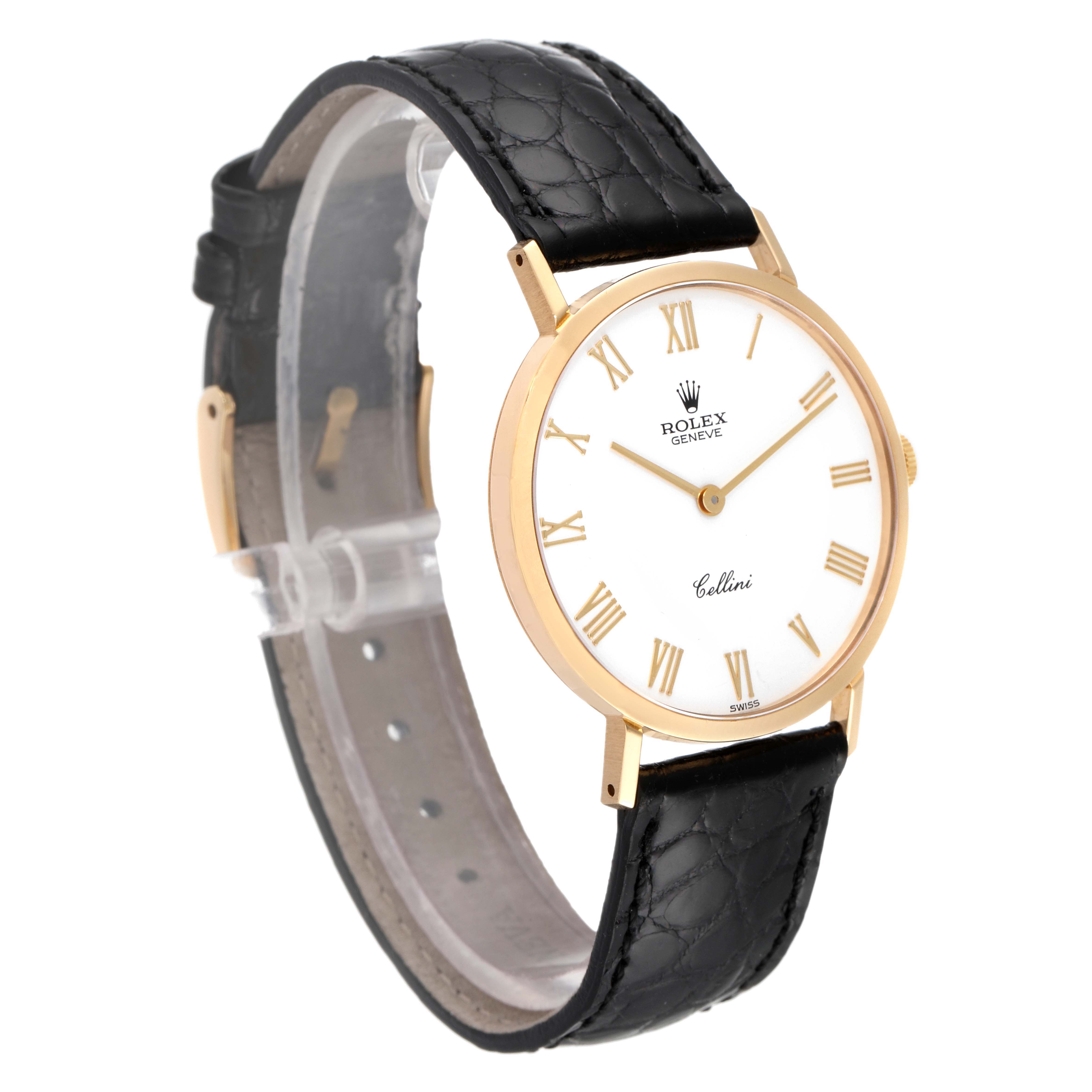 The Rolex Cellini 4112 Men's Yellow Gold White Dial 4112 Men's Yellow Gold White Dial watch is shown at a slight side angle, featuring its round golden case, white dial with Roman numerals, and black leather strap.