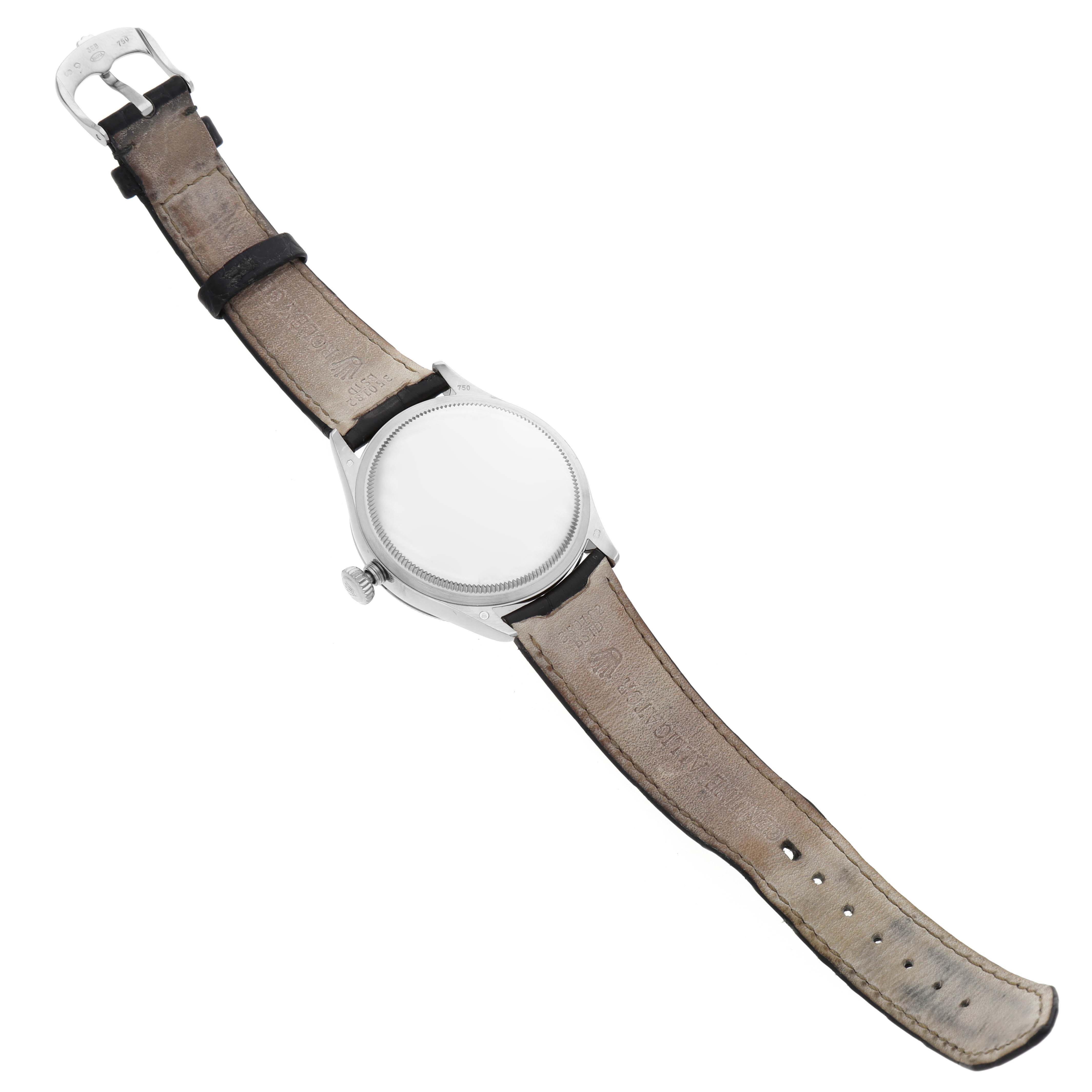 This is a Rolex Cellini 50509 Men's White Gold White Dial 50509 Men's White Gold White Dial watch shown from the back, displaying the case and leather strap.