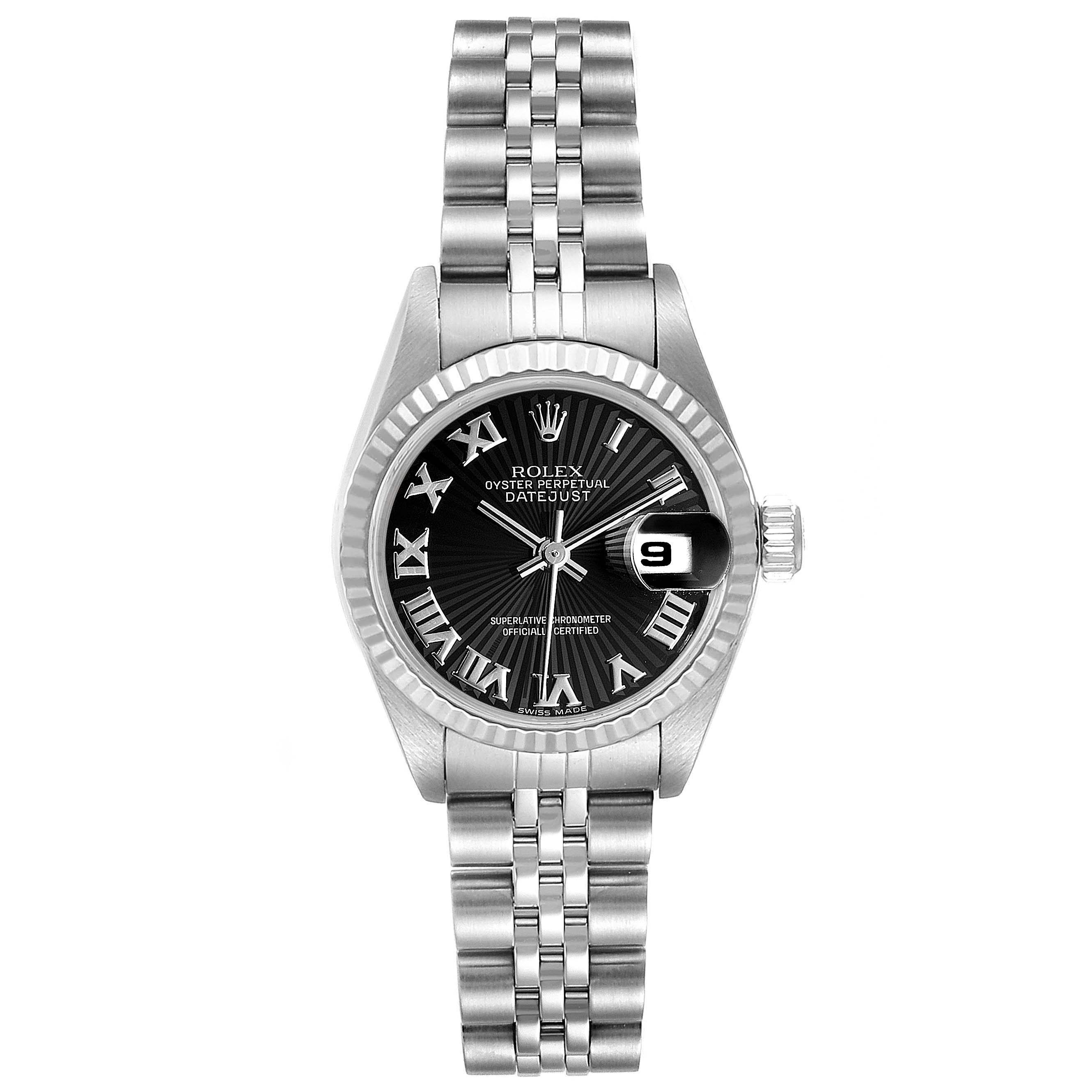 The image shows a frontal view of a Rolex Datejust 79174 Women
s Stainless Steel Black Dial 79174 Women
s Stainless Steel Black Dial watch, including its face, bezel, and Jubilee bracelet.