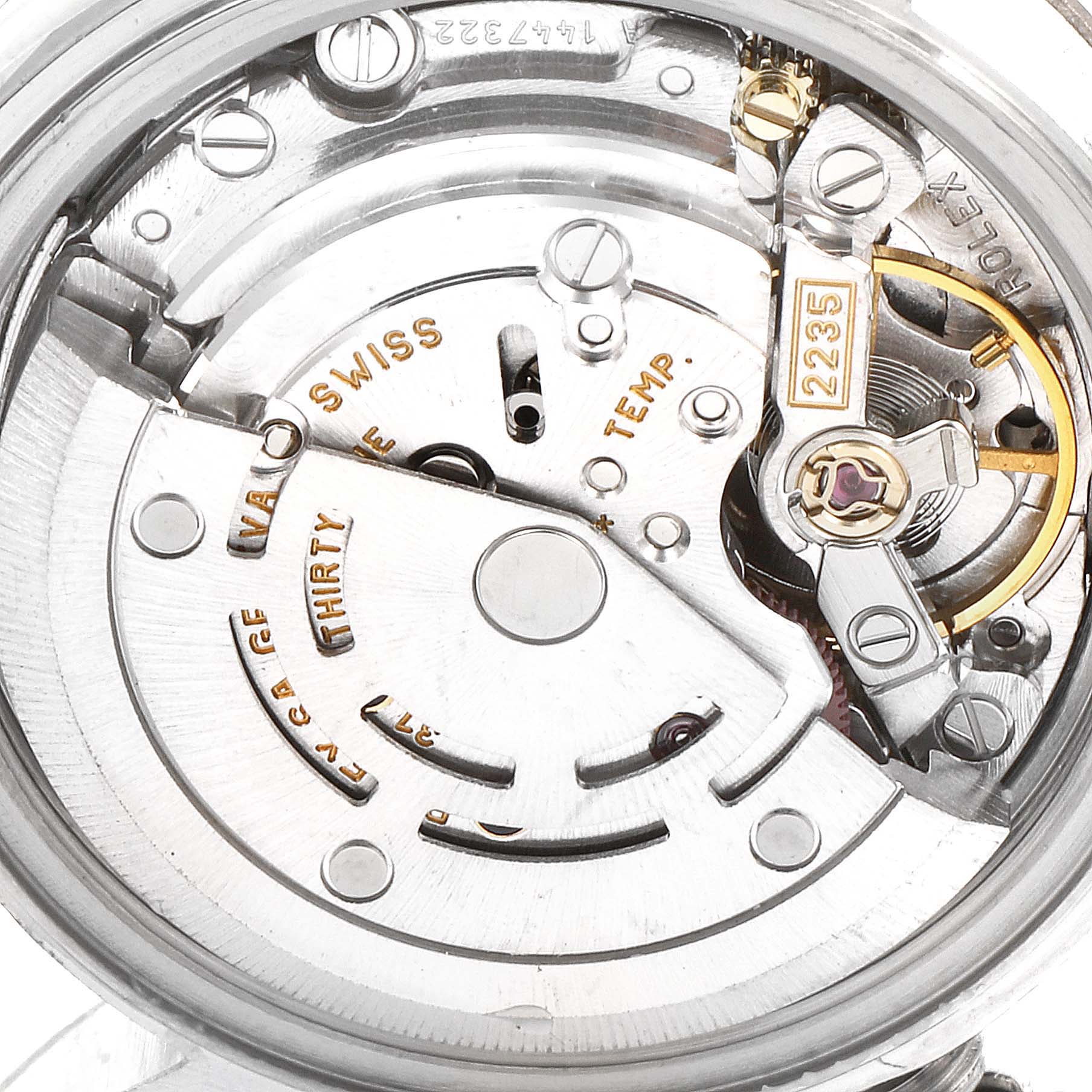 This image shows an angled view of the movement and internal mechanics of a Rolex Datejust 79174 Women
s Stainless Steel Black Dial 79174 Women
s Stainless Steel Black Dial watch.