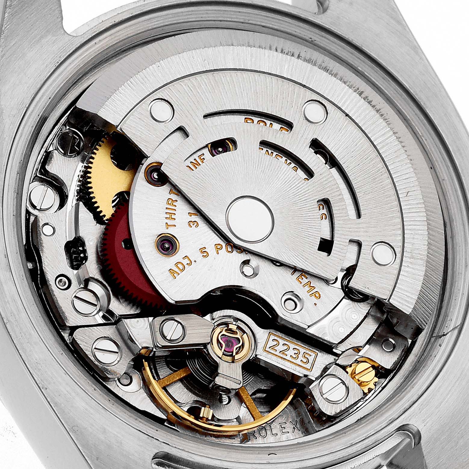 This image shows the internal mechanism and movement of the Rolex Datejust 179173 Women's Steel and Gold (two tone) Silver Dial 179173 Women's Steel and Gold (two tone) Silver Dial watch from a close-up angle.