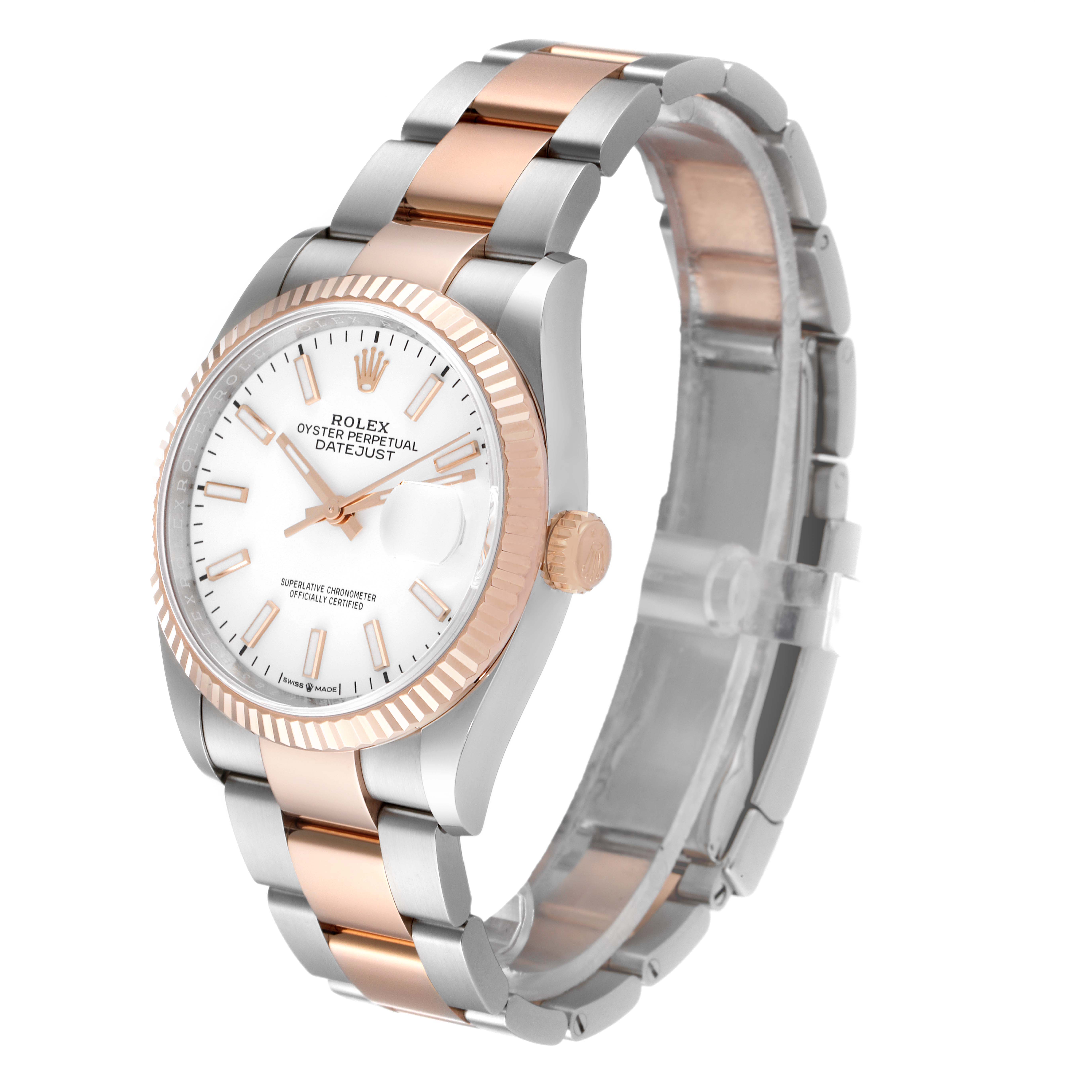 This Rolex Datejust 126231 Men's Steel and Gold (two tone) White Dial 126231 Men's Steel and Gold (two tone) White Dial watch is captured at a slight side angle, showing the dial, bezel, crown, and bracelet.