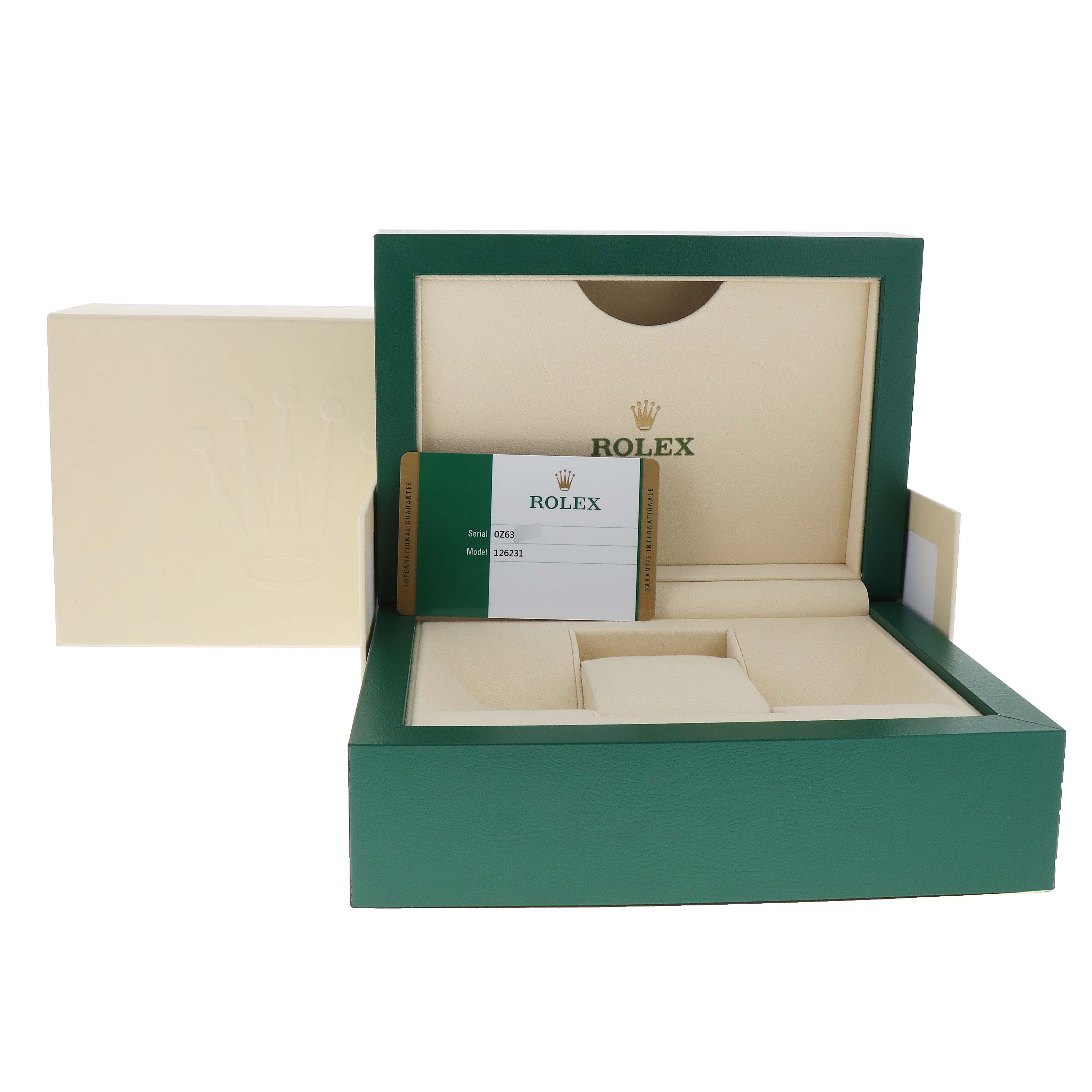 The image shows an open Rolex Datejust 126231 Men's Steel and Gold (two tone) White Dial 126231 Men's Steel and Gold (two tone) White Dial watch box, featuring the storage sections and a certification card.