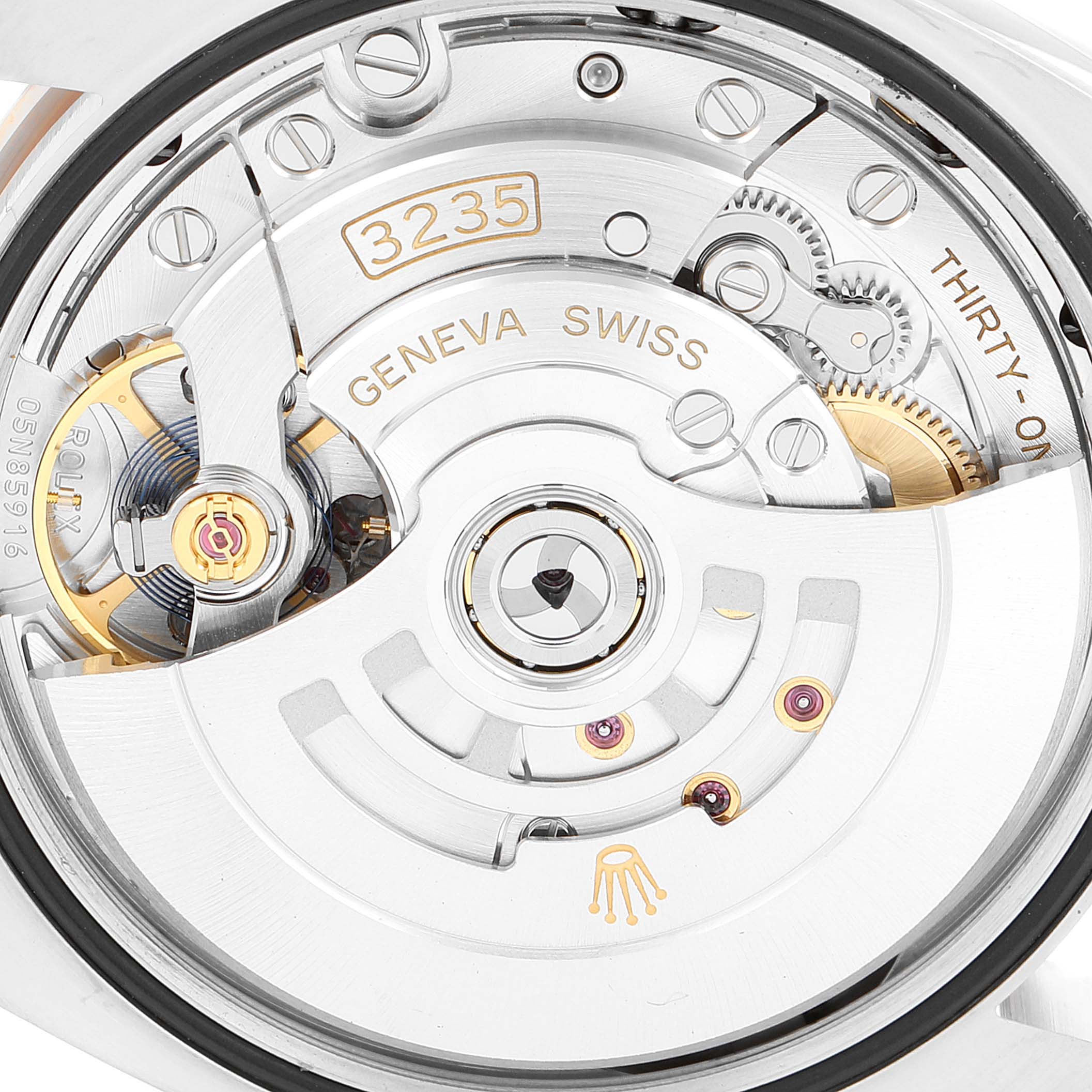 The image shows a close-up view of the movement parts for a Rolex Datejust 126231 Men's Steel and Gold (two tone) White Dial 126231 Men's Steel and Gold (two tone) White Dial watch, highlighting the 3235 caliber.