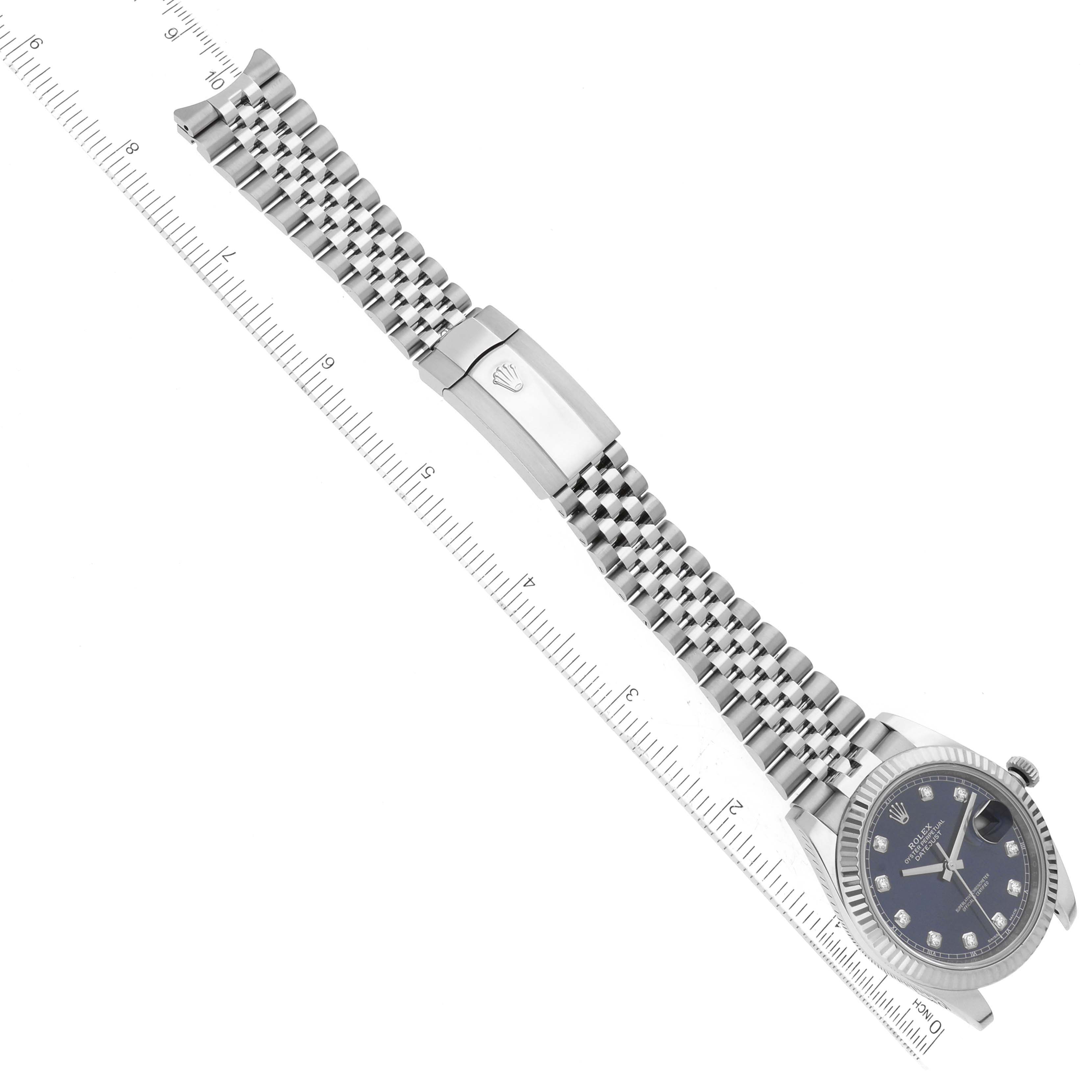 The image shows a top-view of a Rolex Datejust 41 126334 Men's Stainless Steel Blue Dial 126334 Men's Stainless Steel Blue Dial watch, including its face, fluted bezel, and Jubilee bracelet with a clasp.