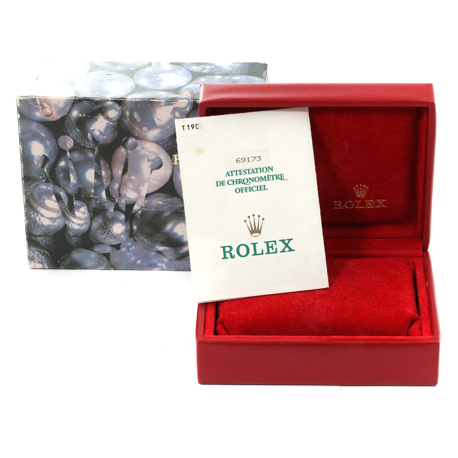 This image shows the packaging and warranty certificate for a Rolex Datejust 69173 Women's Steel and Gold (two tone) Champagne Dial 69173 Women's Steel and Gold (two tone) Champagne Dial watch, including a red box and official documentation.