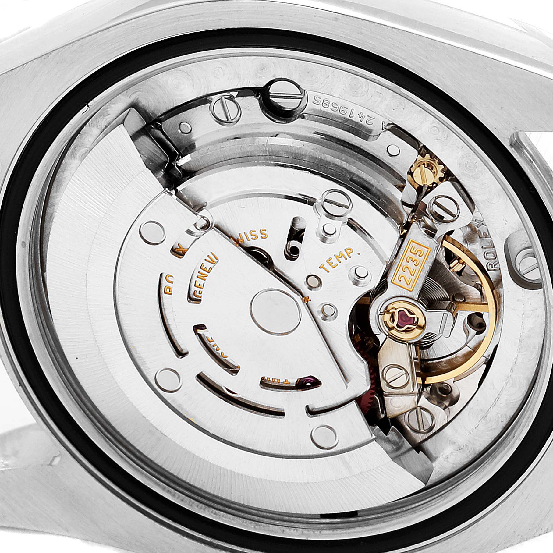 This image shows the internal mechanical movement of the Rolex Mid-Size 178274 Women's Stainless Steel Pink Dial 178274 Women's Stainless Steel Pink Dial watch taken from a close-up angle.