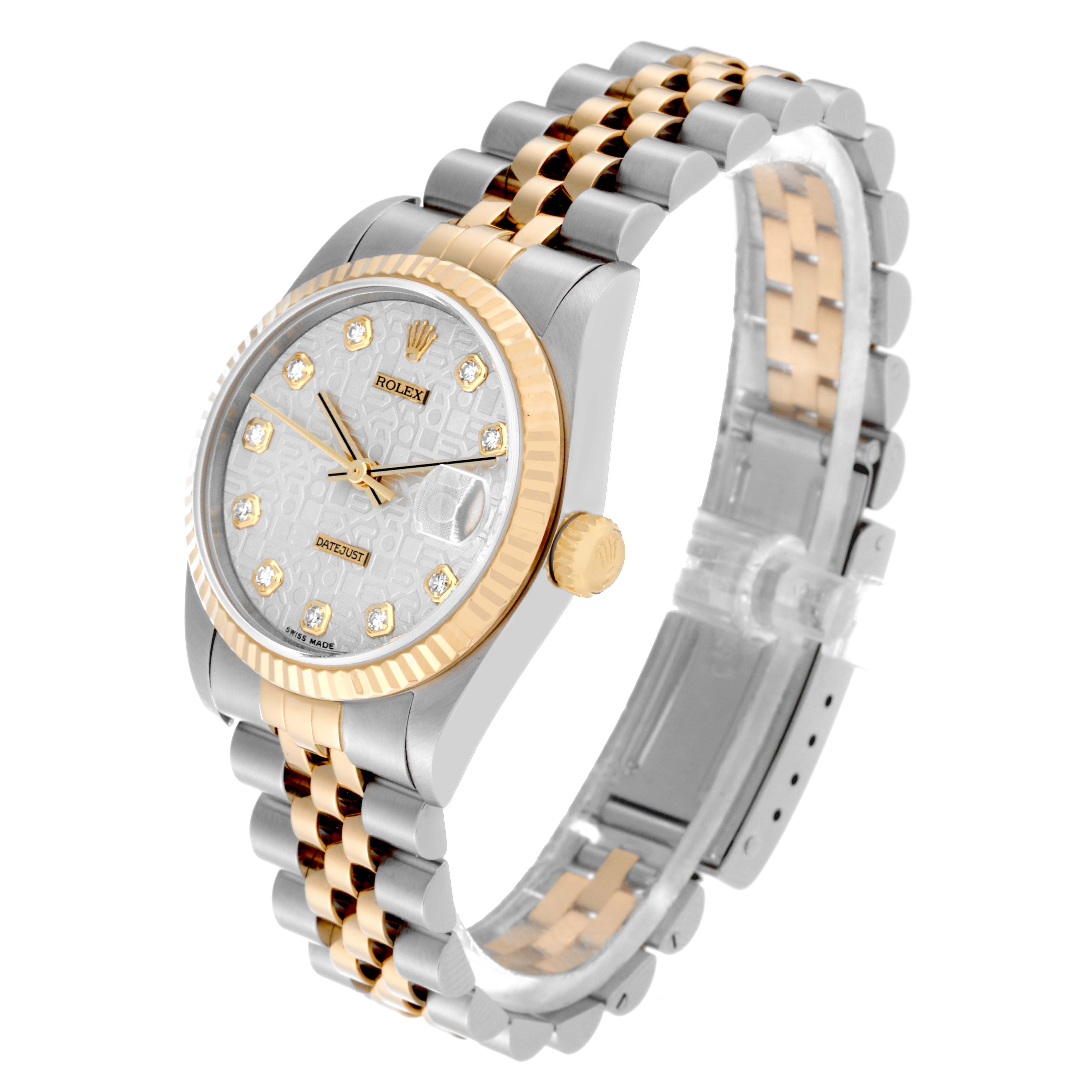 This angled view displays the face, bezel, crown, and Jubilee bracelet of the Rolex Mid-Size 78273 Women
s Steel and Gold (two tone) Silver Dial 78273 Women
s Steel and Gold (two tone) Silver Dial watch.