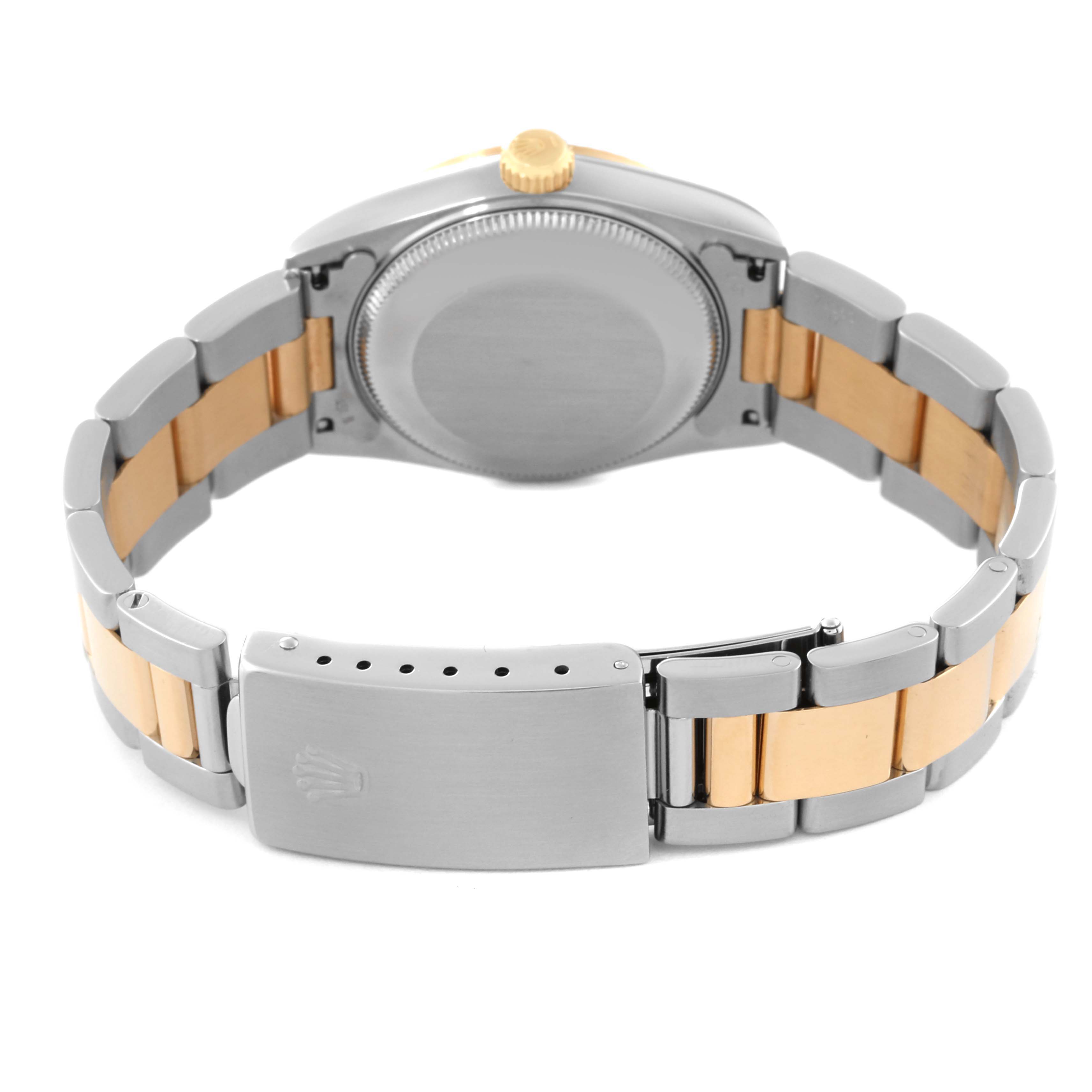 The image shows the back of a Rolex Mid-Size 68273 Women's Steel and Gold (two tone) White Dial 68273 Women's Steel and Gold (two tone) White Dial watch, highlighting its bracelet and clasp.