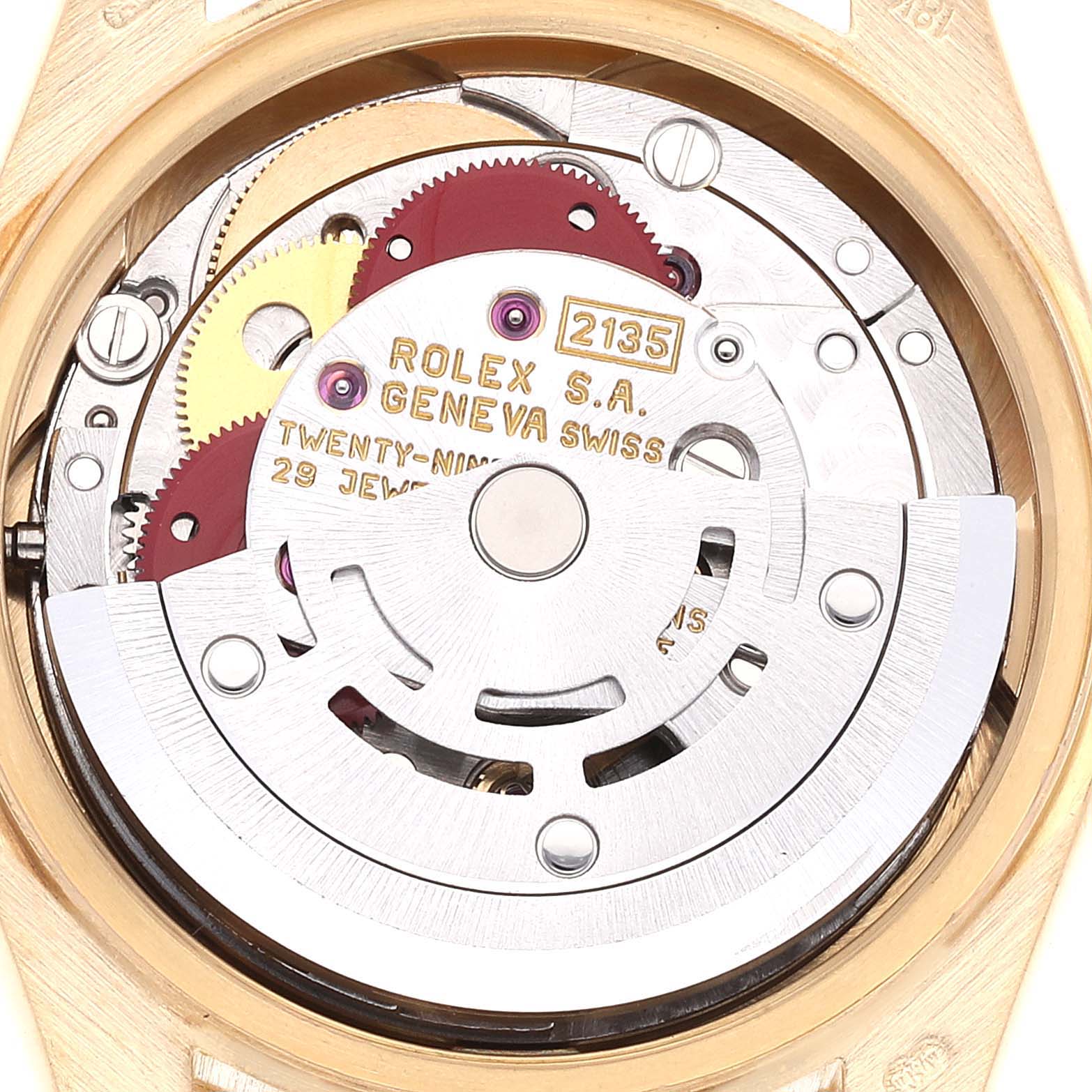 This image shows the intricate inner mechanism of the Rolex President 69178 Women
s Yellow Gold Champagne Dial 69178 Women
s Yellow Gold Champagne Dial model watch from a close-up angle.