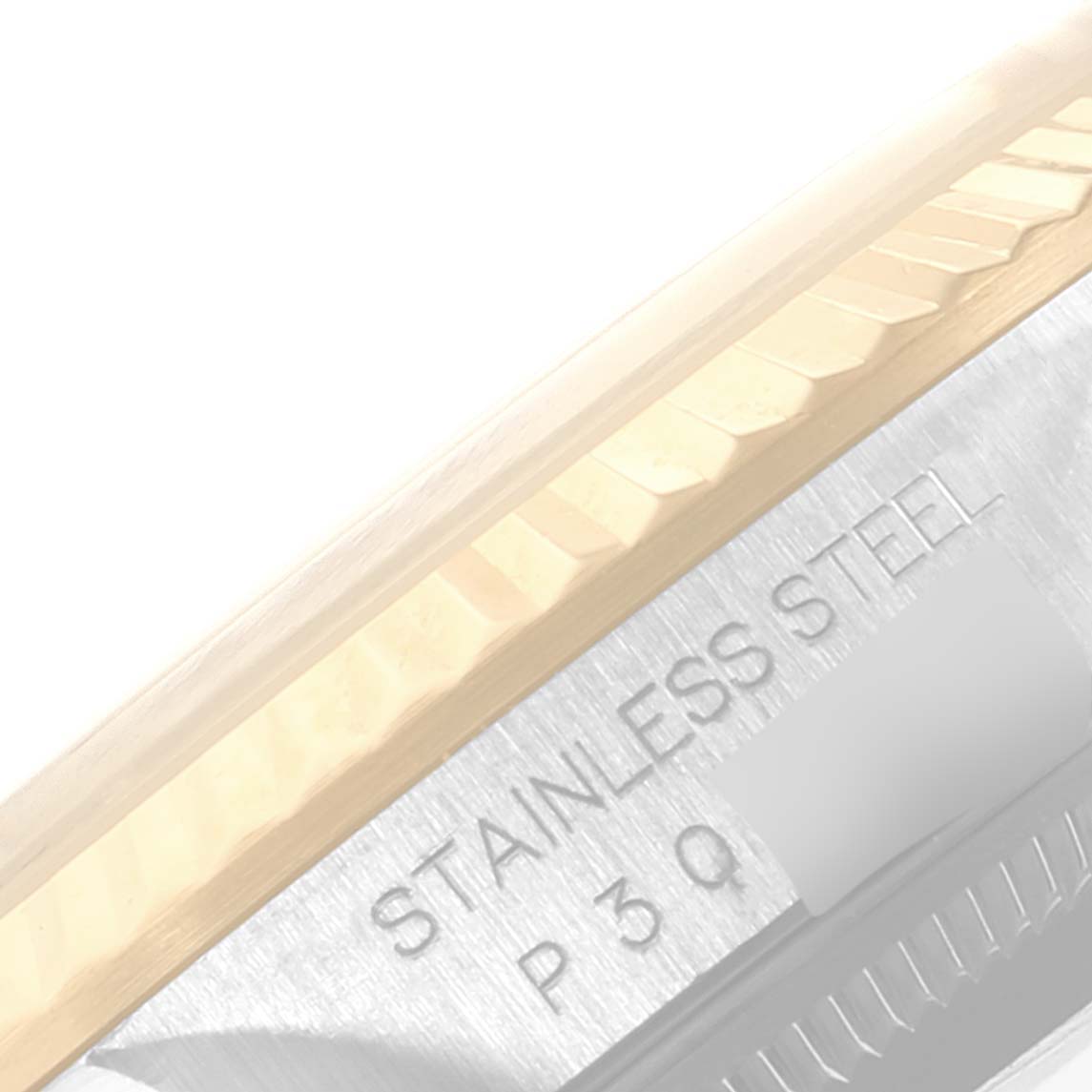 The image shows a close-up of the fluted bezel and case side of a Rolex Datejust 16233 Men's Steel and Gold (two tone) Blue Dial 16233 Men's Steel and Gold (two tone) Blue Dial, highlighting "STAINLESS STEEL" engraving.