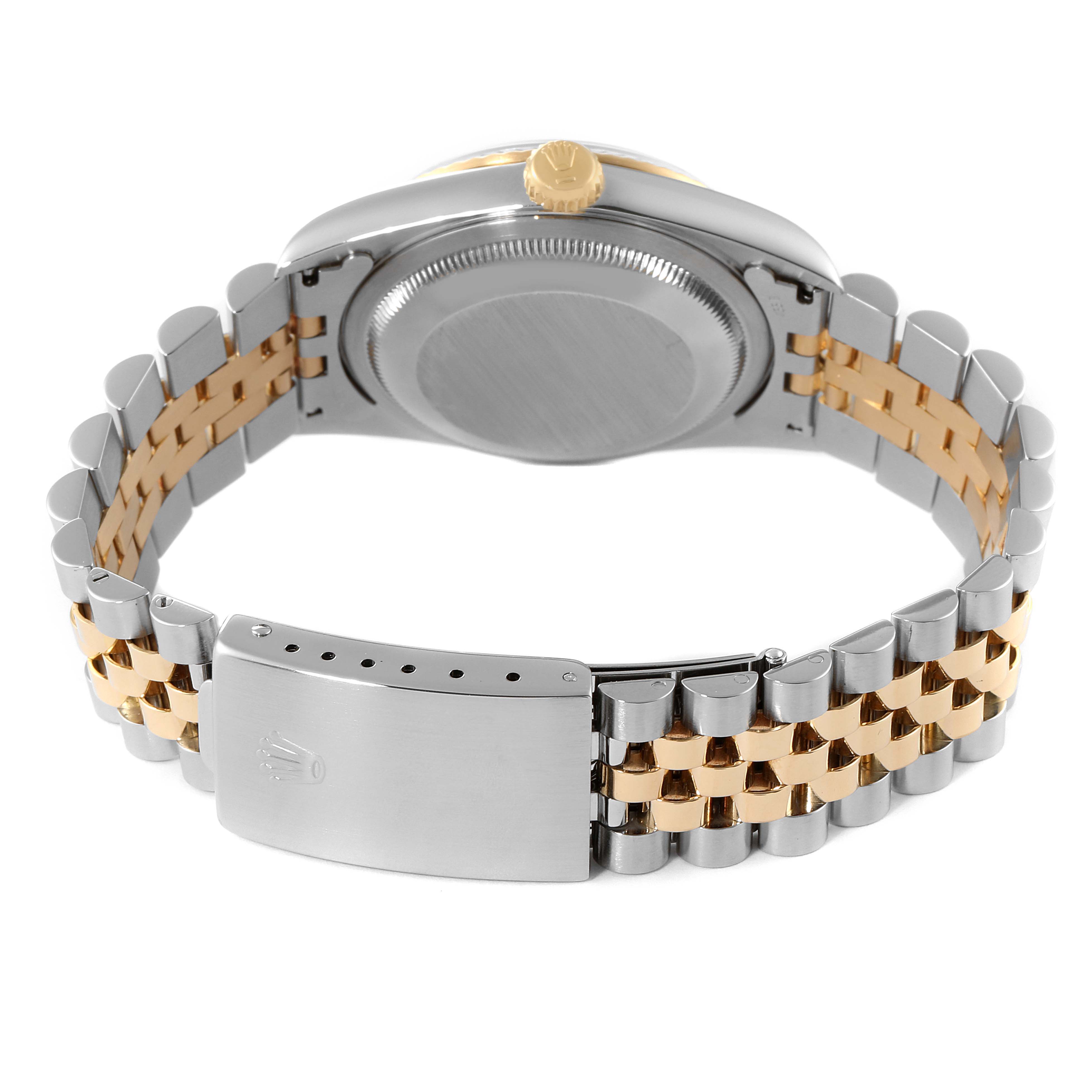 The image shows the back and clasp of a Rolex Datejust 16233 Men's Steel and Gold (two tone) Blue Dial 16233 Men's Steel and Gold (two tone) Blue Dial watch, highlighting its two-tone bracelet.