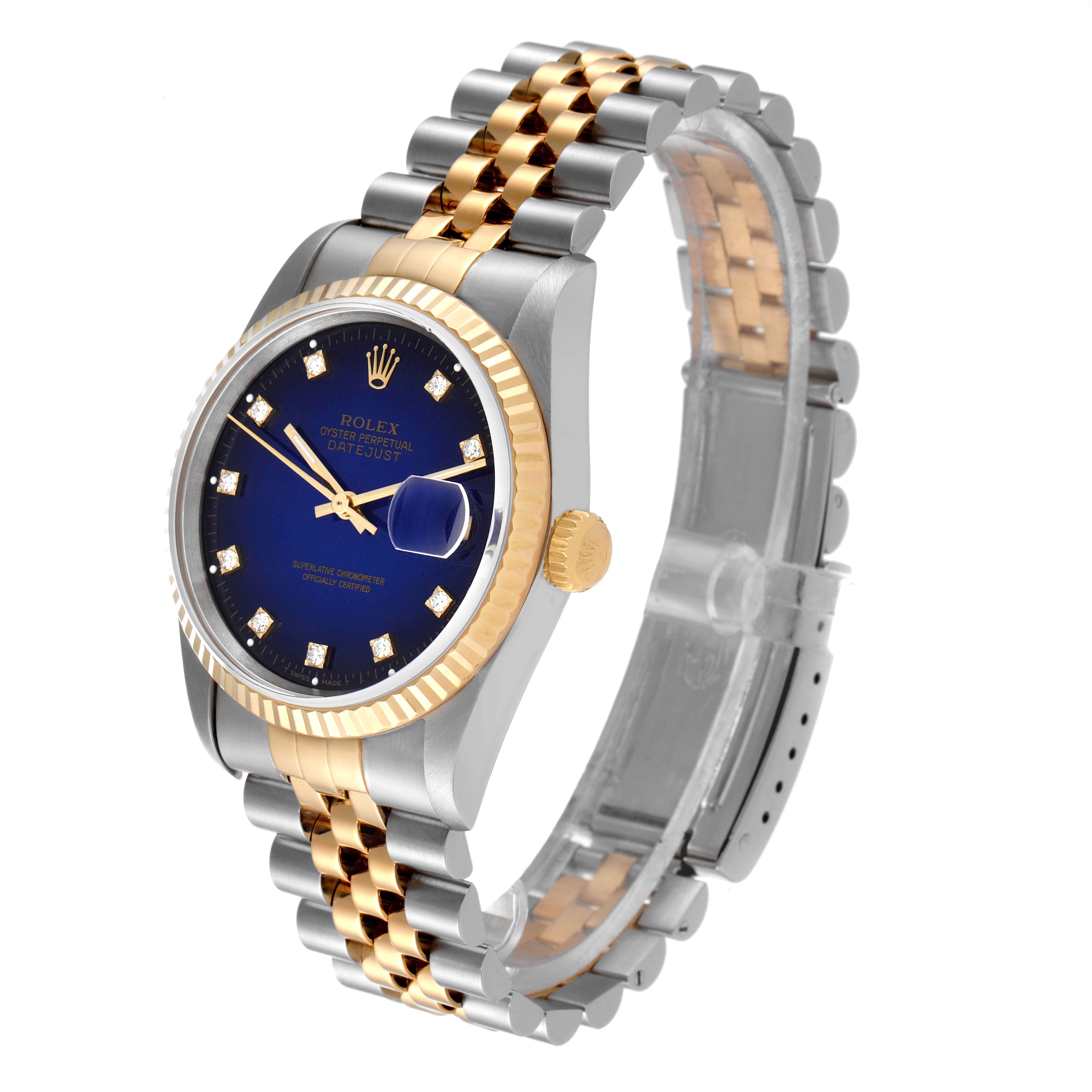 The image shows a Rolex Datejust 16233 Men's Steel and Gold (two tone) Blue Dial 16233 Men's Steel and Gold (two tone) Blue Dial watch at a slight angle, highlighting its blue dial, jubilee bracelet, and gold fluted bezel.