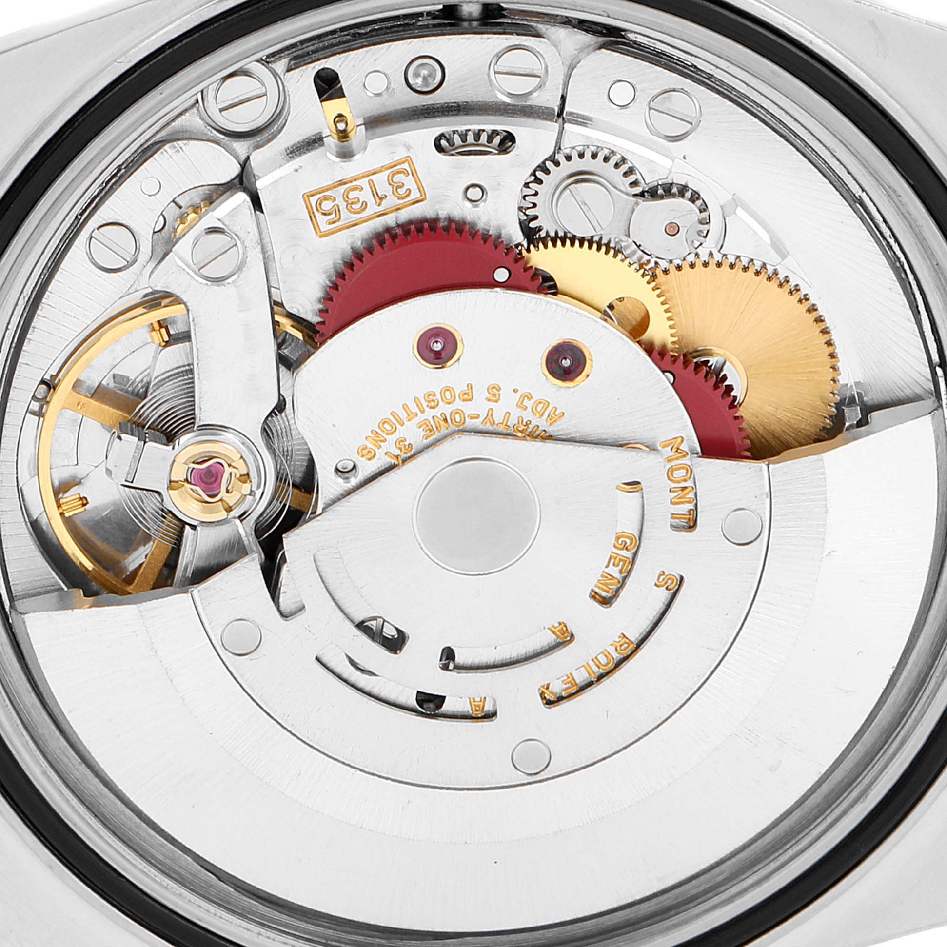 This image shows the intricate mechanical movement parts of a Rolex Datejust 16233 Men's Steel and Gold (two tone) Blue Dial 16233 Men's Steel and Gold (two tone) Blue Dial watch from a rear angle.