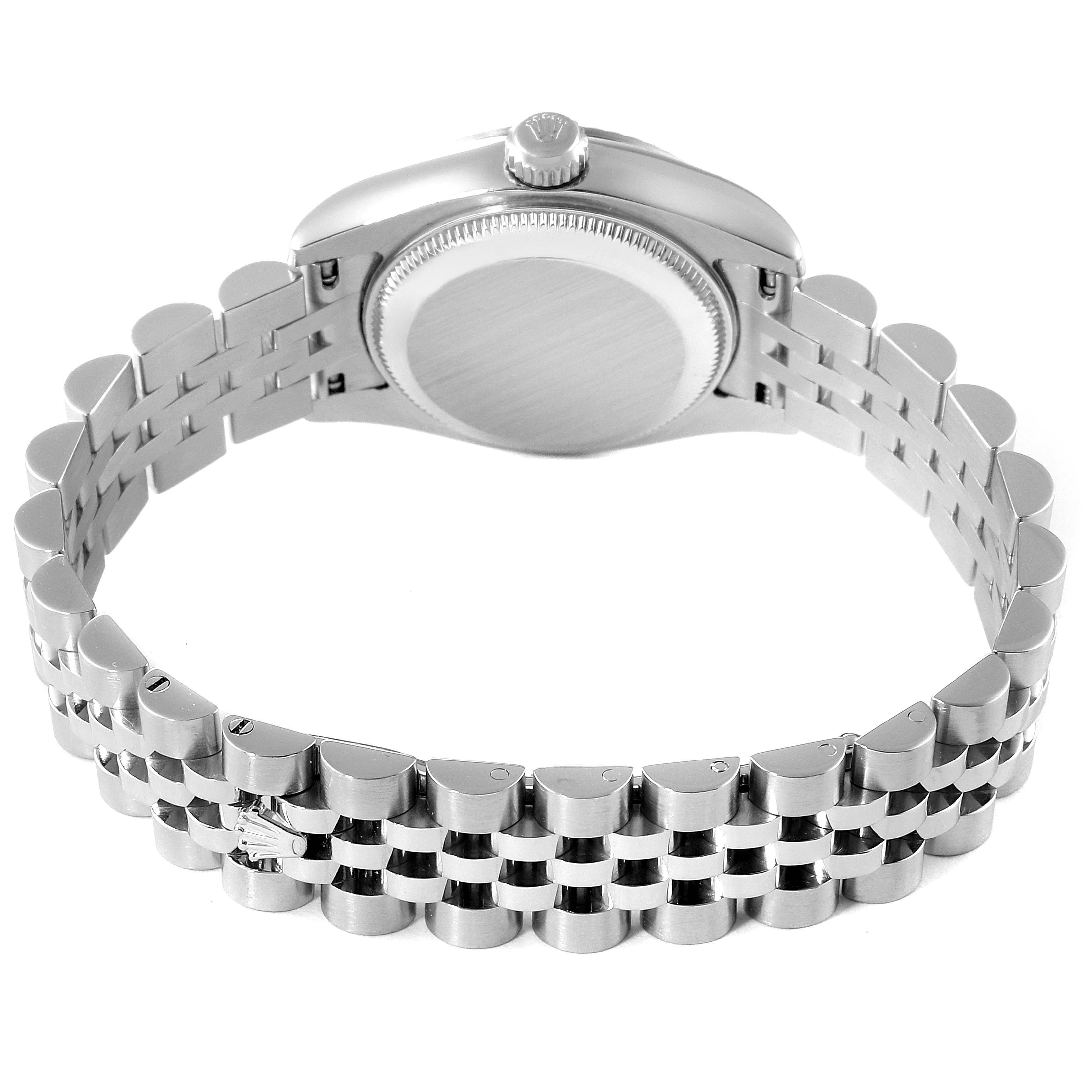 The image shows the back case and bracelet of the Rolex Datejust 179174 Women's Stainless Steel Mother of Pearl Dial 179174 Women's Stainless Steel Mother of Pearl Dial watch at an overhead angle.