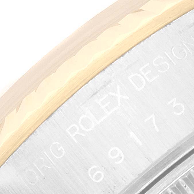 This image shows a close-up of the model number engraving on the side of a Rolex Datejust 69173 Women's Steel and Gold (two tone) Champagne Dial 69173 Women's Steel and Gold (two tone) Champagne Dial watch.