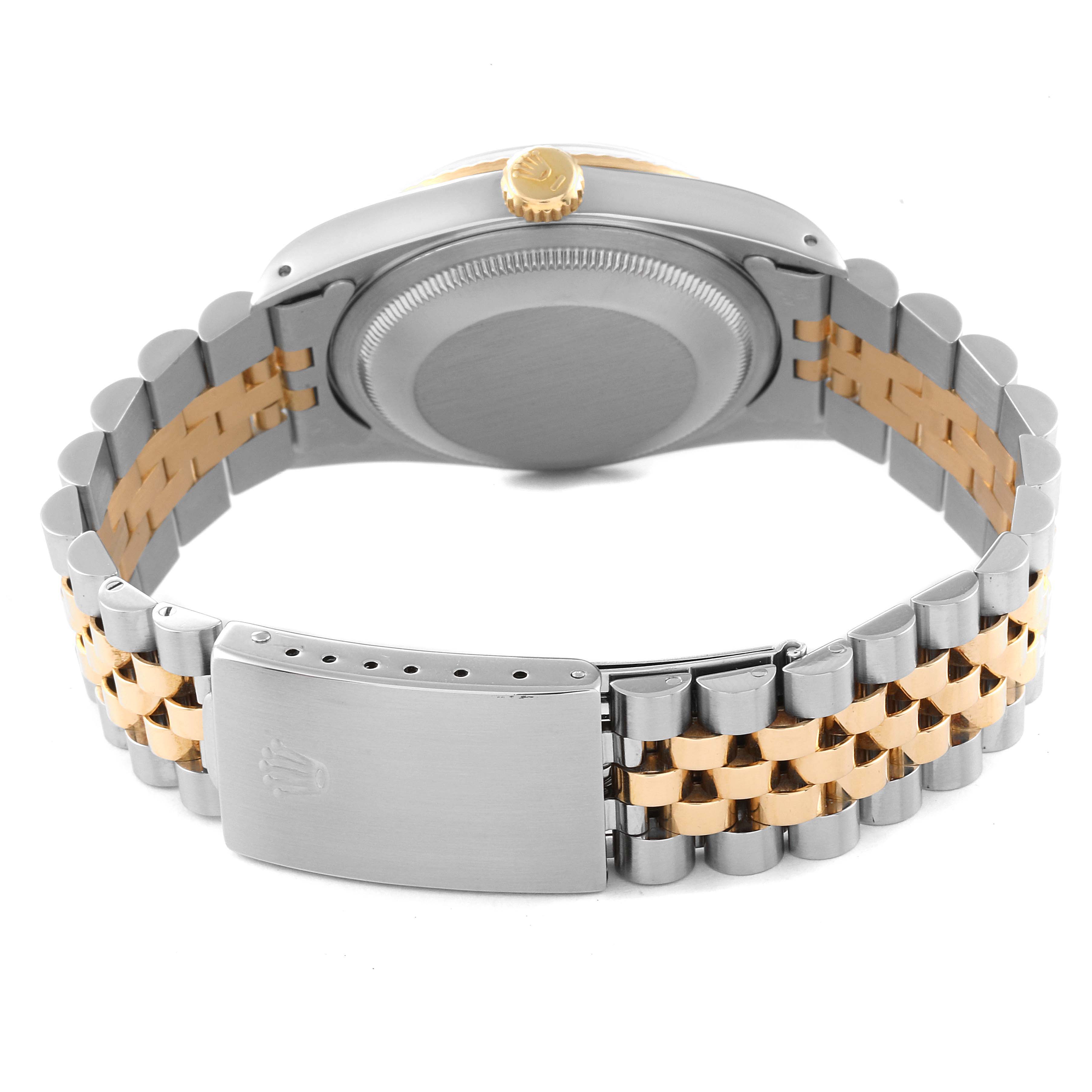 This image shows the back of the Rolex Datejust 16233 Men's Steel and Gold (two tone) Beige Dial 16233 Men's Steel and Gold (two tone) Beige Dial watch, focusing on the bracelet, clasp, and caseback.