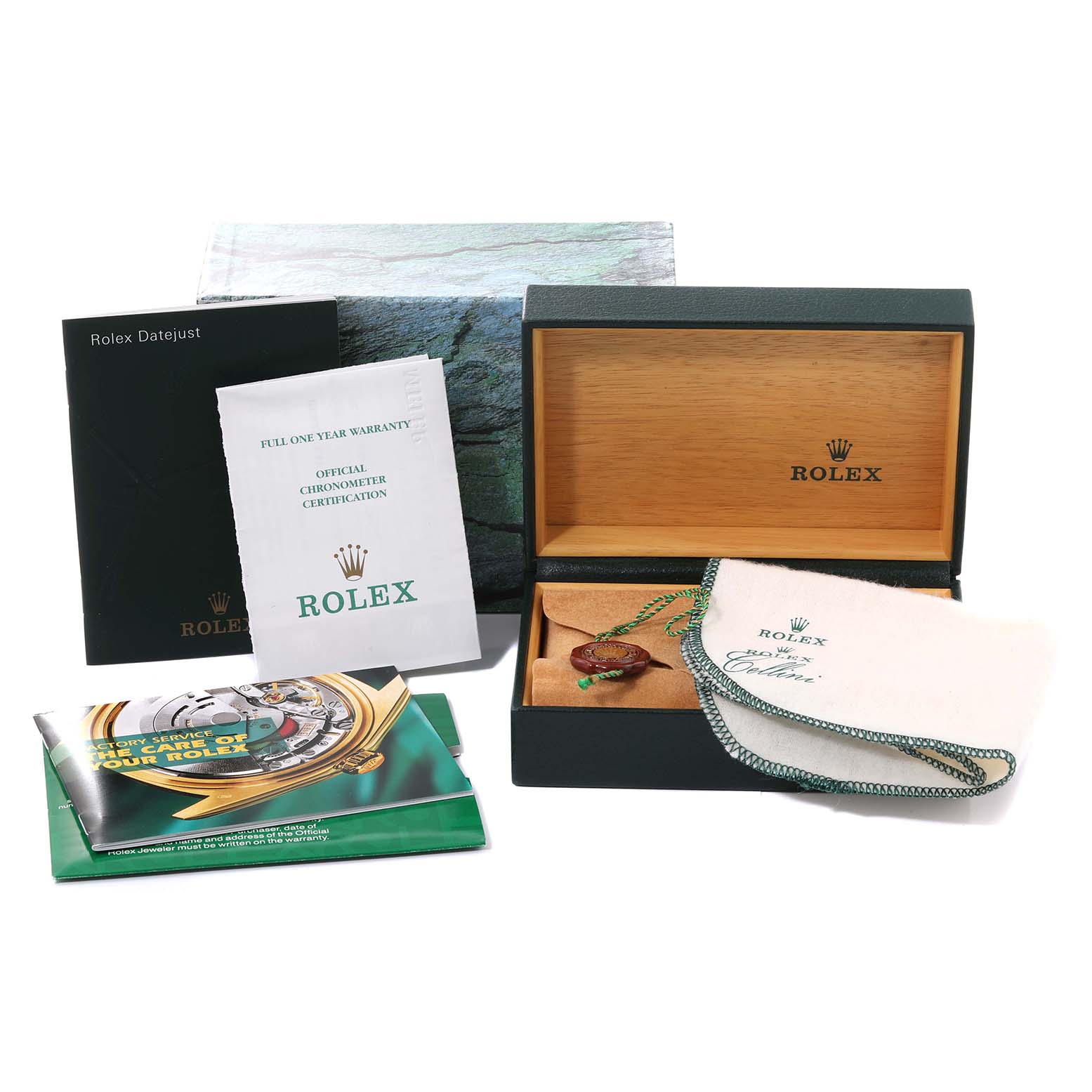 The image shows a Rolex Datejust 79173 Women's Steel and Gold (two tone) White Dial 79173 Women's Steel and Gold (two tone) White Dial watch box, manuals, warranty card, certification, and a cloth, all from a top-down angle.