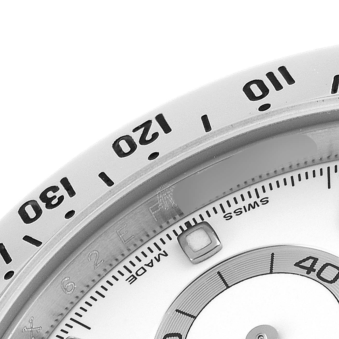 This close-up angle captures the bezel, scale, and part of the dial on the Rolex Daytona 116520 Men's Stainless Steel White Dial 116520 Men's Stainless Steel White Dial watch.