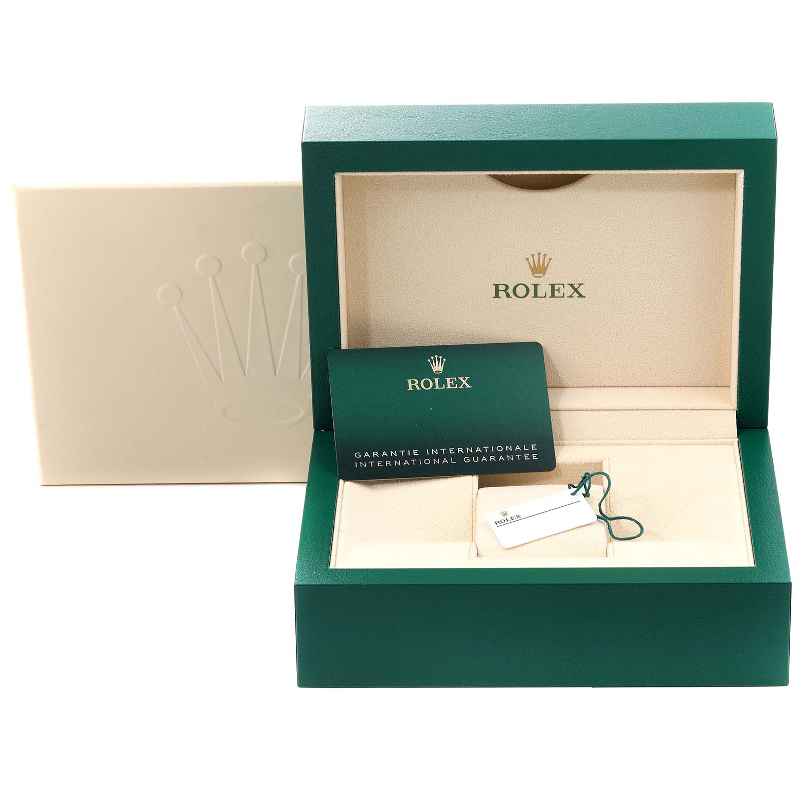 The image shows an opened green box for the Rolex Explorer 124270 Men
s Stainless Steel Black Dial 124270 Men
s Stainless Steel Black Dial watch with a guarantee card and a tag inside.