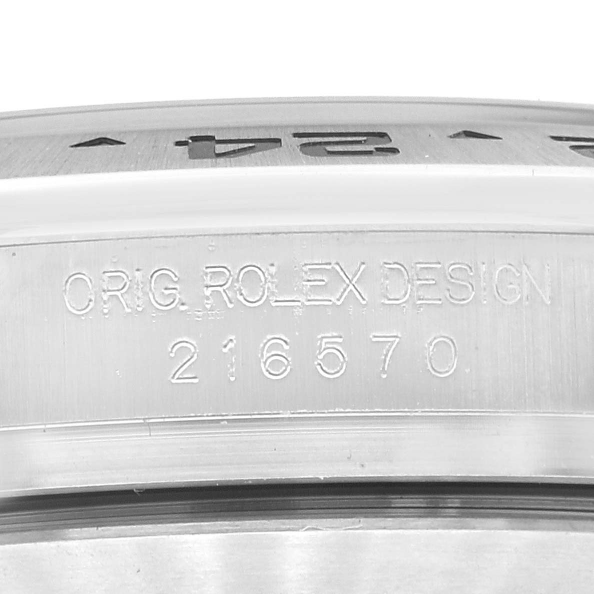 This image shows a close-up view of the side of a Rolex Explorer 216570 Men
s Stainless Steel White Dial 216570 Men
s Stainless Steel White Dial model, specifically highlighting the engraved design number "216570."