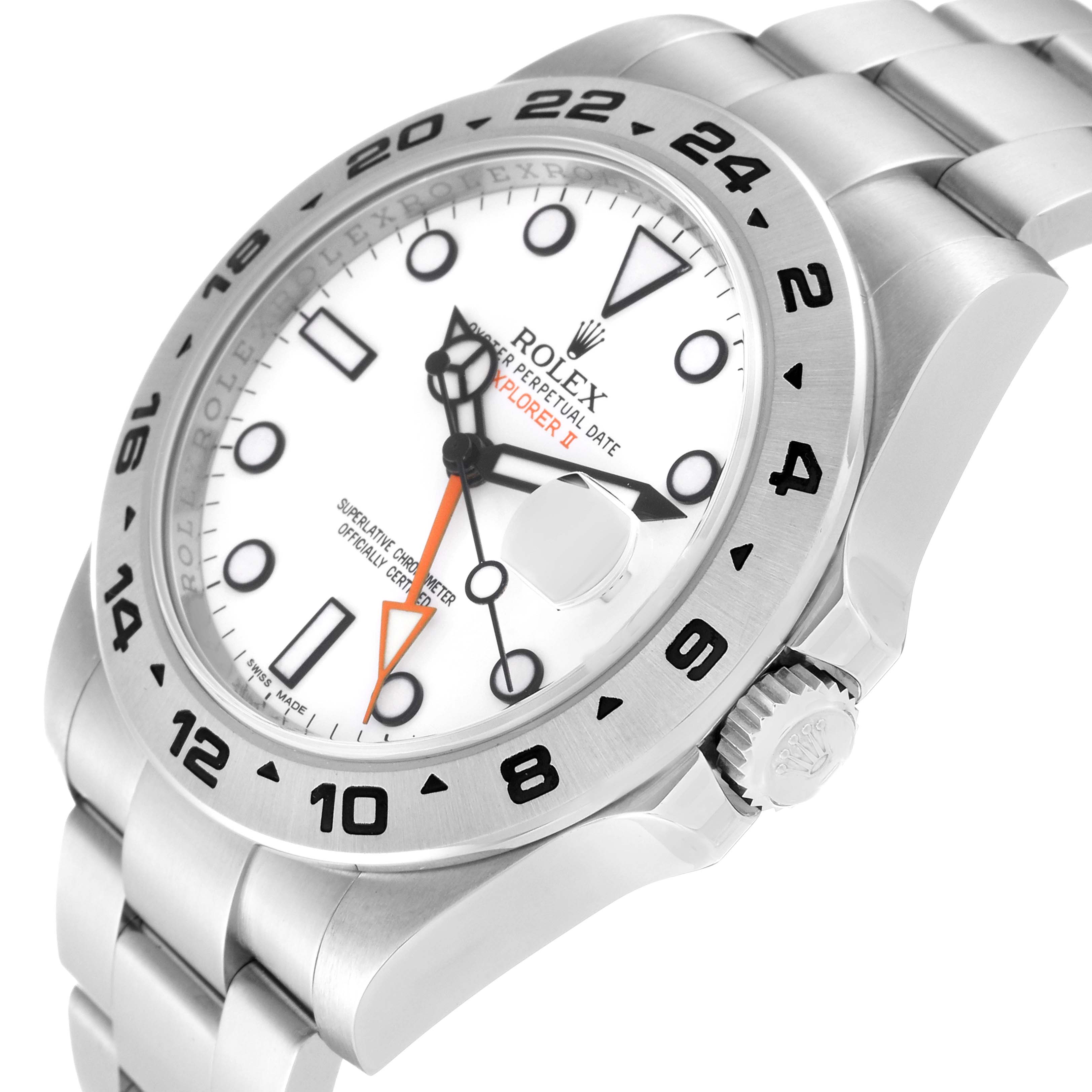 The Rolex Explorer 216570 Men's Stainless Steel White Dial 216570 Men's Stainless Steel White Dial watch is shown at an angled close-up, highlighting its face, bezel, and part of its stainless steel bracelet.