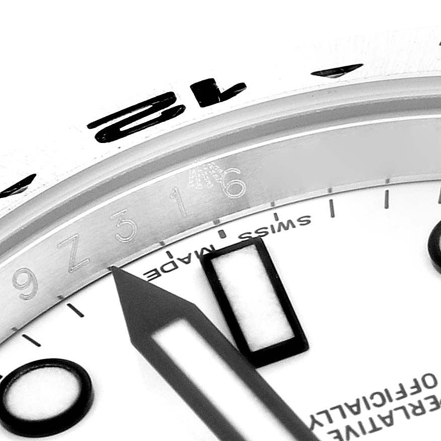 The image shows a close-up angle of the dial and hands of a Rolex Explorer 216570 Men's Stainless Steel White Dial 216570 Men's Stainless Steel White Dial watch, highlighting its indices and markings.