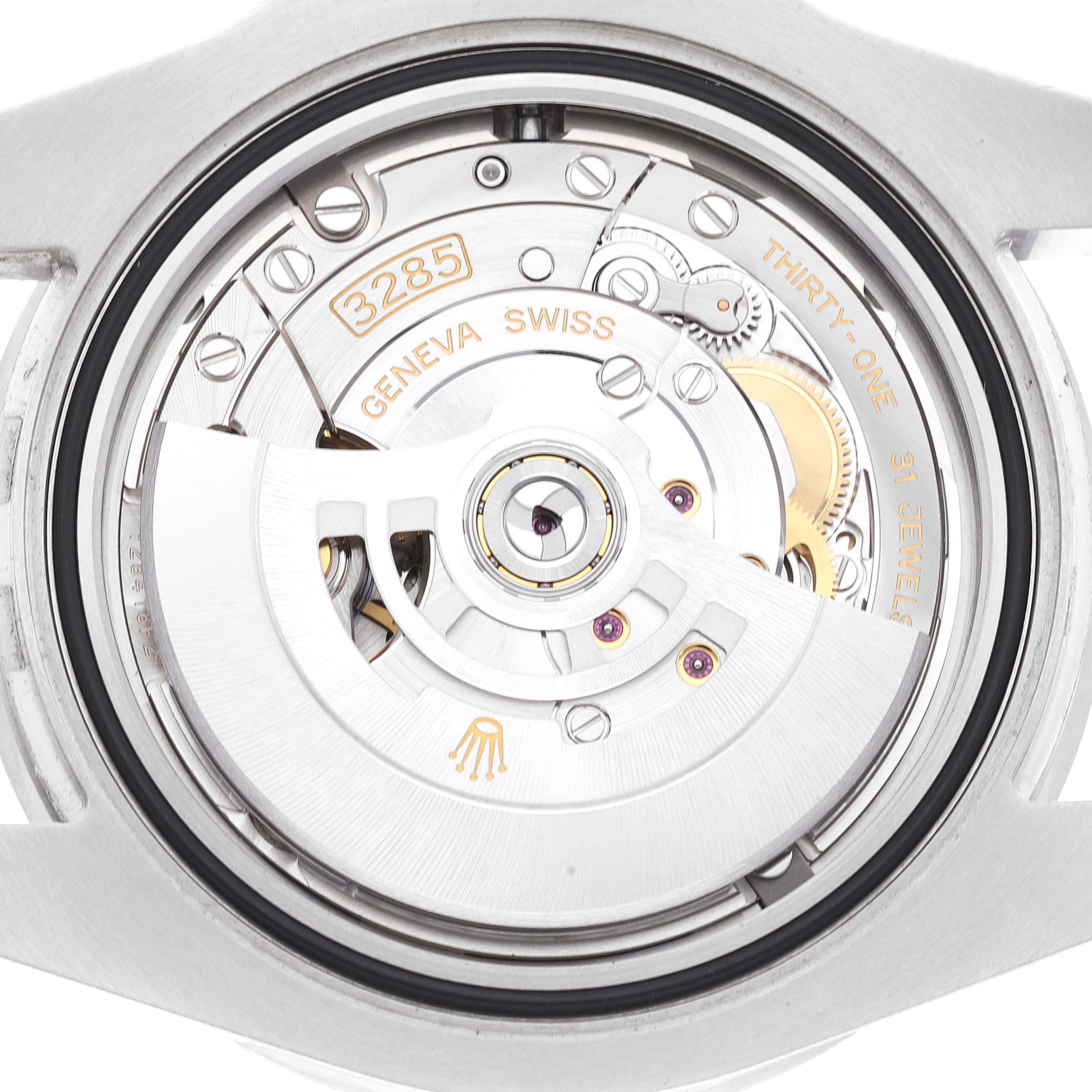 The image shows the back view of a Rolex GMT-Master 126710BLRO Men
s Stainless Steel Black Dial 126710BLRO Men
s Stainless Steel Black Dial watch, highlighting the movement and inner mechanical parts.