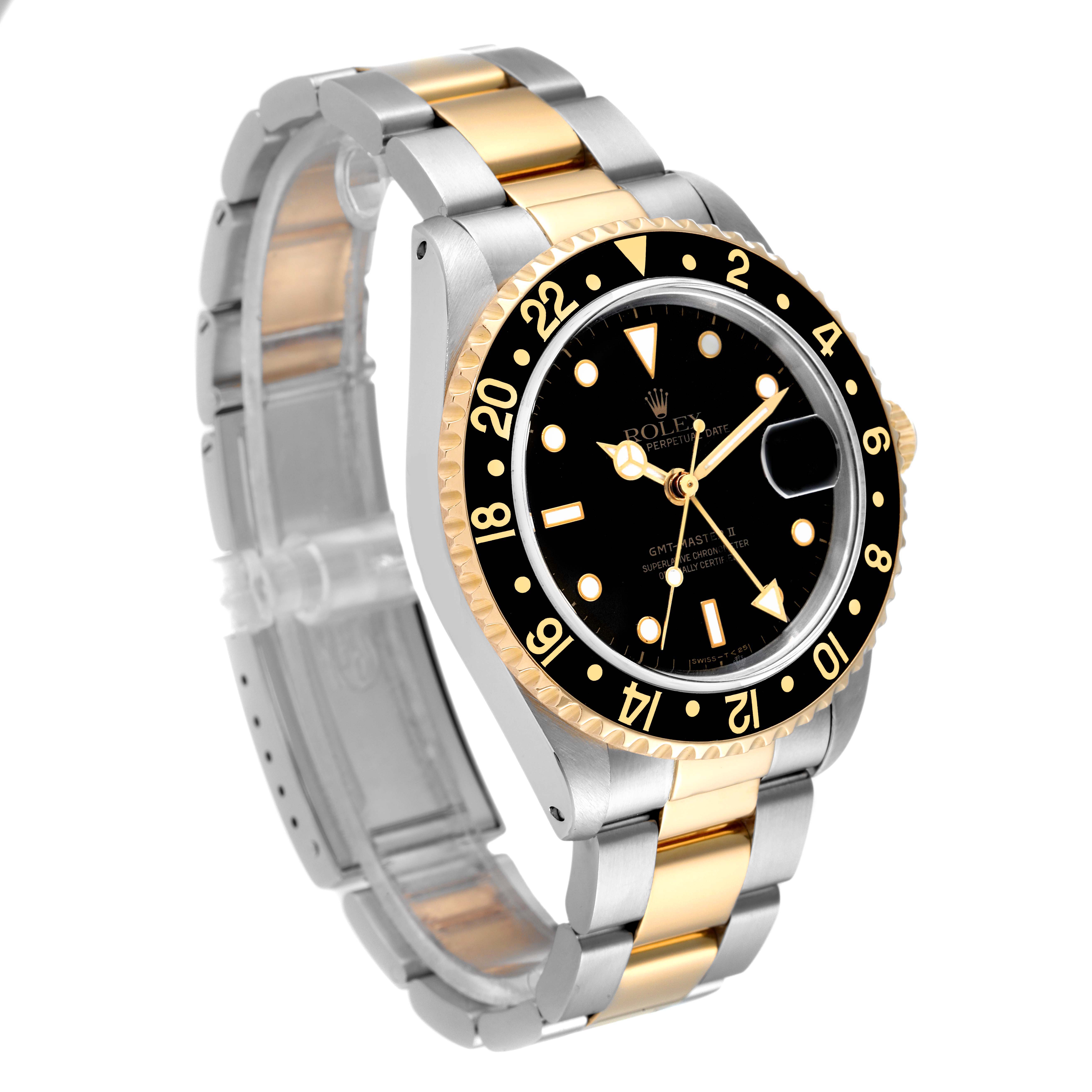 The image shows a side angle of a Rolex GMT-Master 16713 Men's Steel and Gold (two tone) Black Dial 16713 Men's Steel and Gold (two tone) Black Dial watch, displaying its bezel, dial, hands, and two-tone bracelet.
