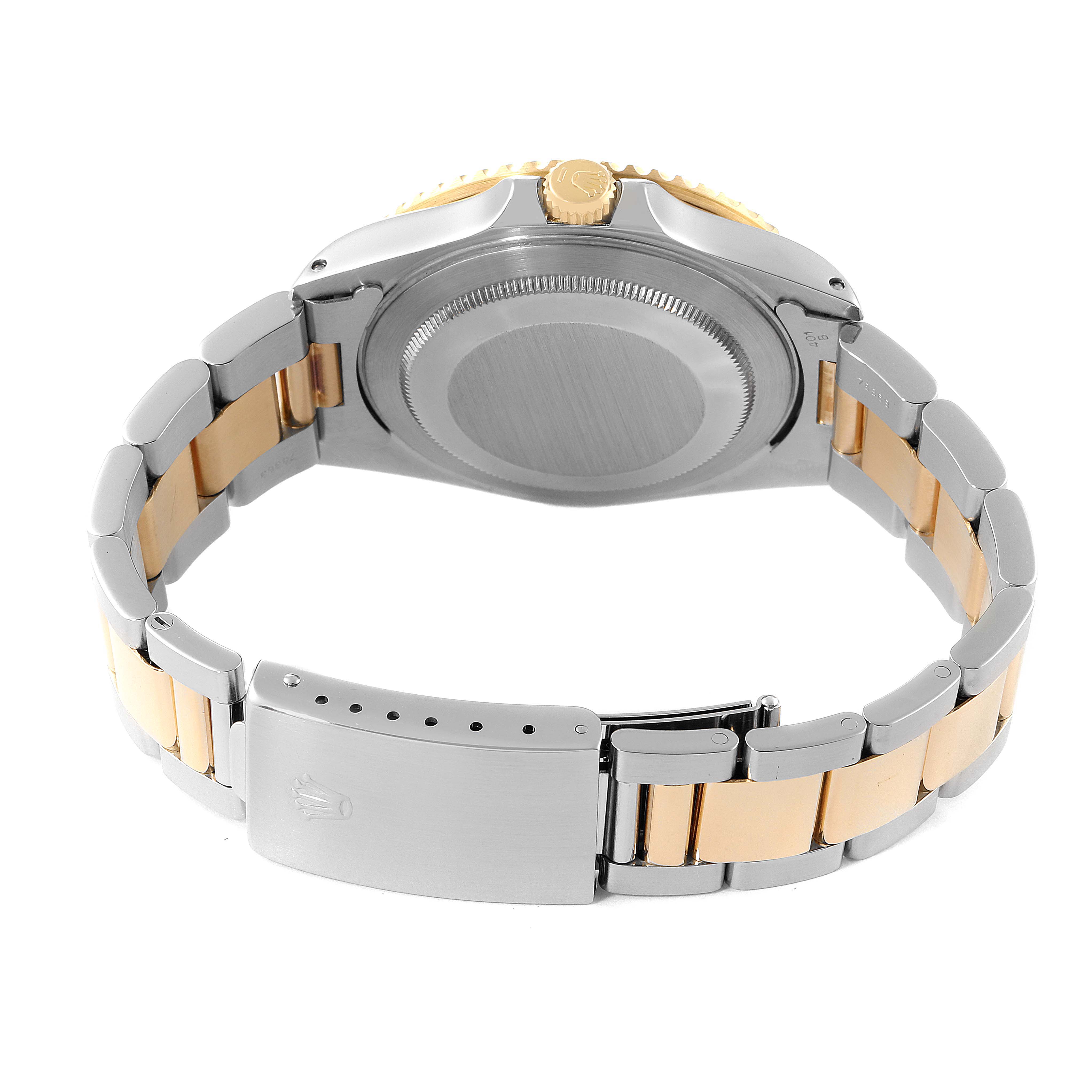 The image shows the back view of a Rolex GMT-Master 16713 Men's Steel and Gold (two tone) Black Dial 16713 Men's Steel and Gold (two tone) Black Dial watch, highlighting the case back, bracelet, and clasp.