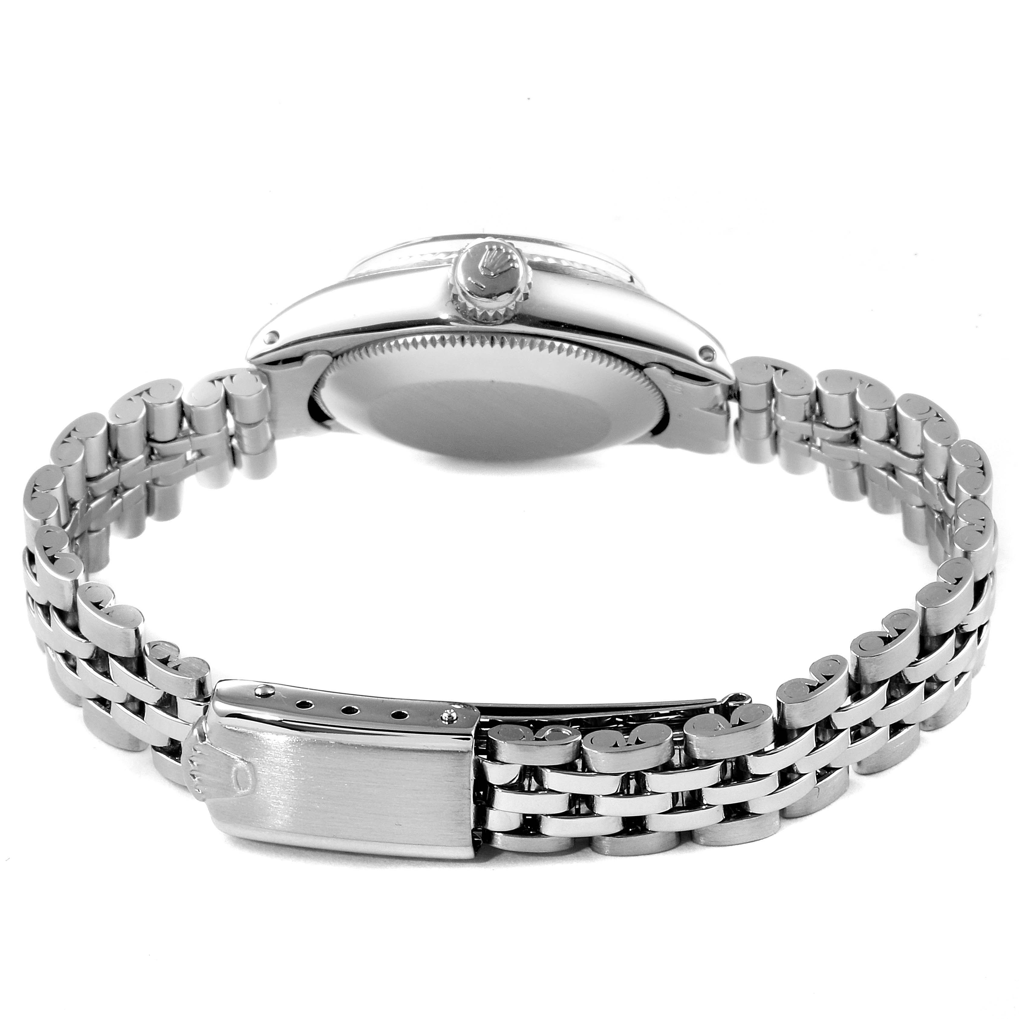 The image shows a side angle view of a Rolex Oyster Perpetual 6619 Women's Stainless Steel Silver Dial 6619 Women's Stainless Steel Silver Dial, displaying its stainless steel case and bracelet, along with the clasp and crown.