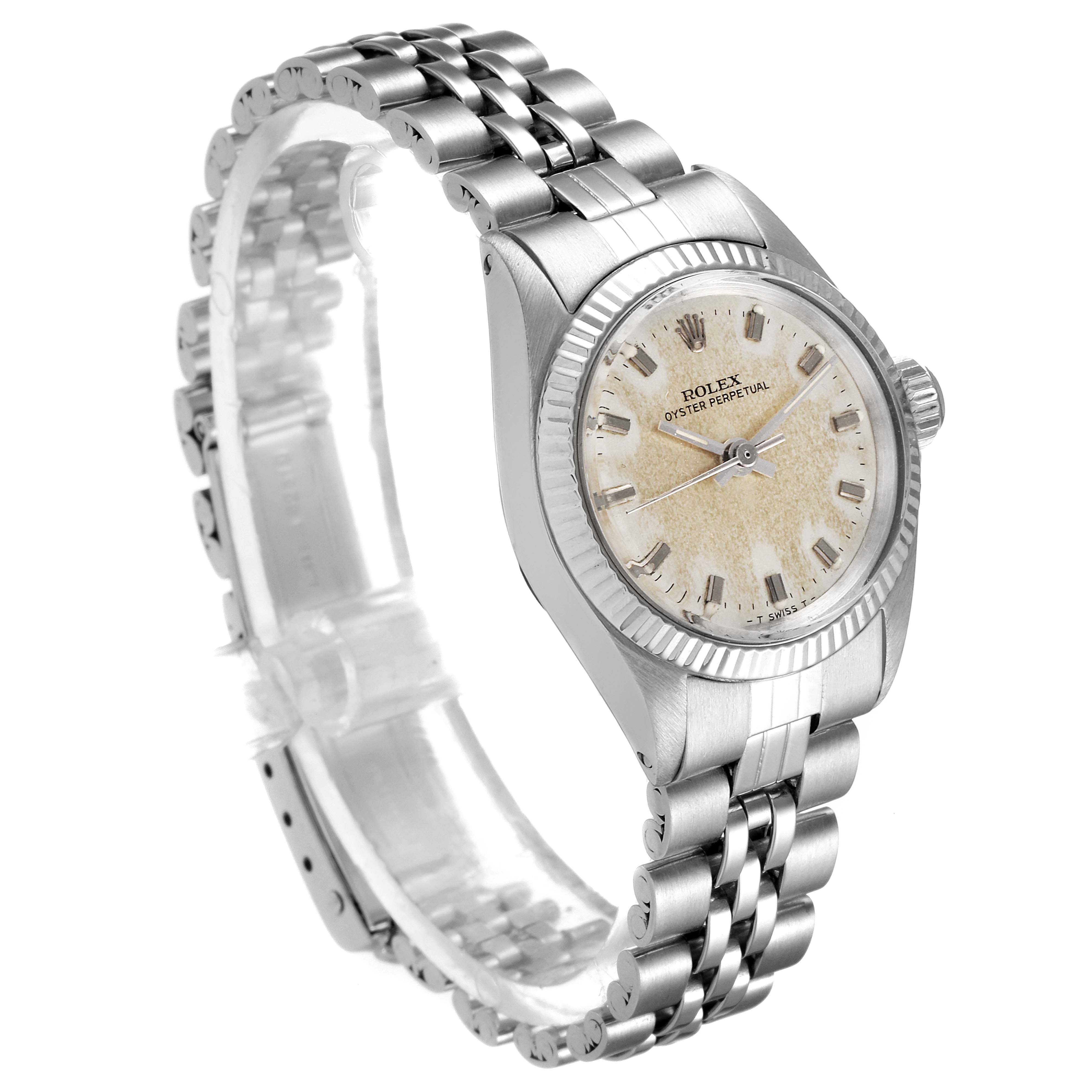 This image shows a side angle of a Rolex Oyster Perpetual 6619 Women's Stainless Steel Silver Dial 6619 Women's Stainless Steel Silver Dial watch, highlighting the face, bezel, and bracelet.