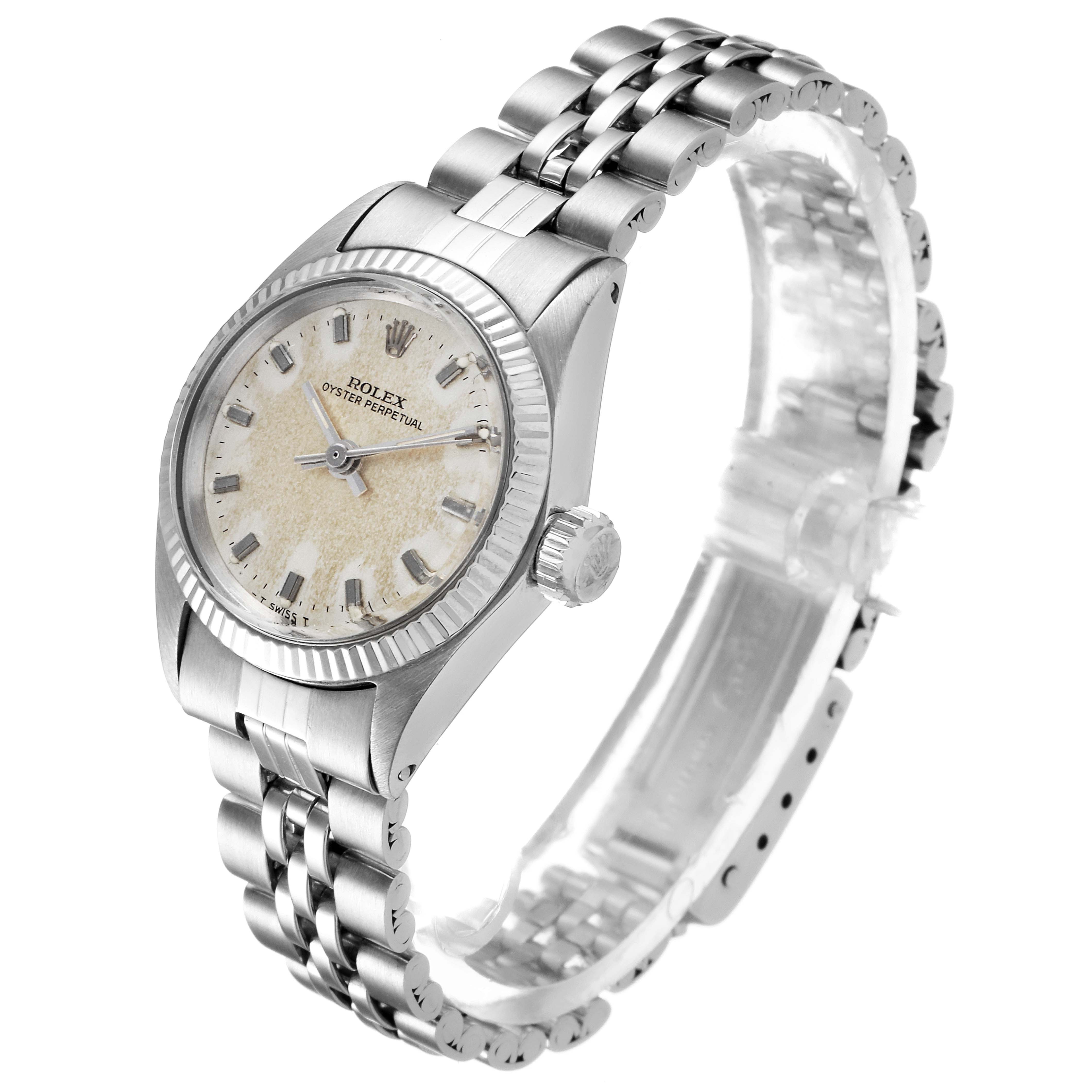 The image shows a Rolex Oyster Perpetual 6619 Women's Stainless Steel Silver Dial 6619 Women's Stainless Steel Silver Dial watch at an angled side view, including its case, bezel, dial, crown, and bracelet.