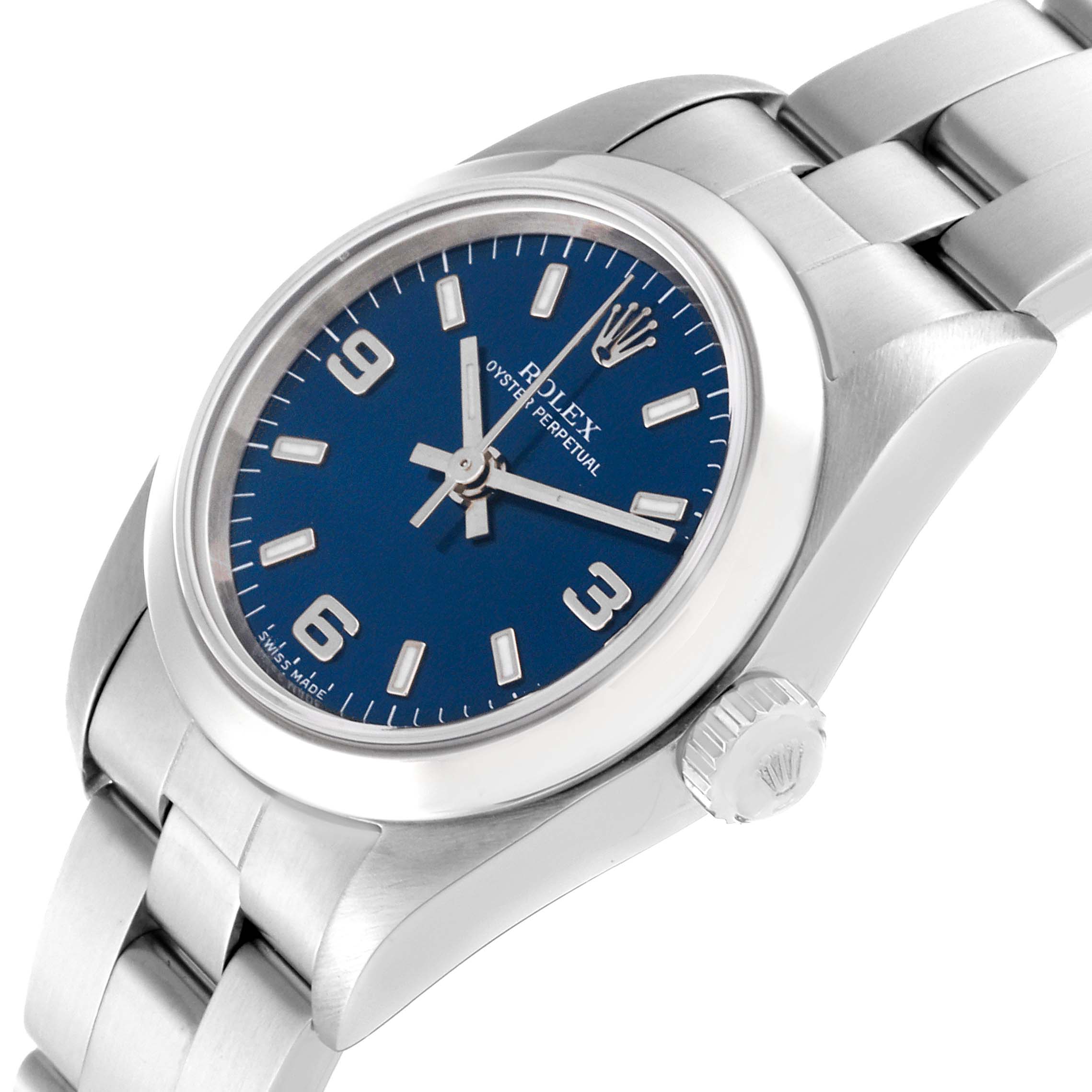 The image shows a close-up side view of a Rolex Oyster Perpetual 76080 Women's Stainless Steel Blue Dial 76080 Women's Stainless Steel Blue Dial watch, focusing on the dial, bezel, and part of the bracelet.