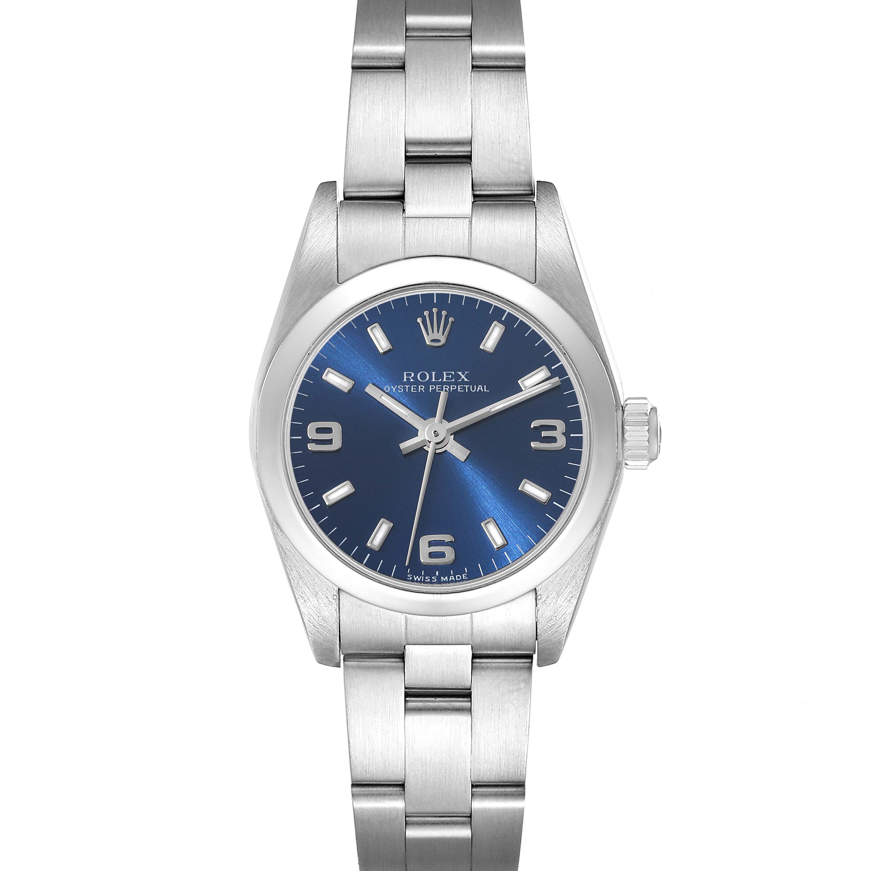 The image shows a front view of a Rolex Oyster Perpetual 76080 Women's Stainless Steel Blue Dial 76080 Women's Stainless Steel Blue Dial watch with a blue dial and a stainless steel bracelet.