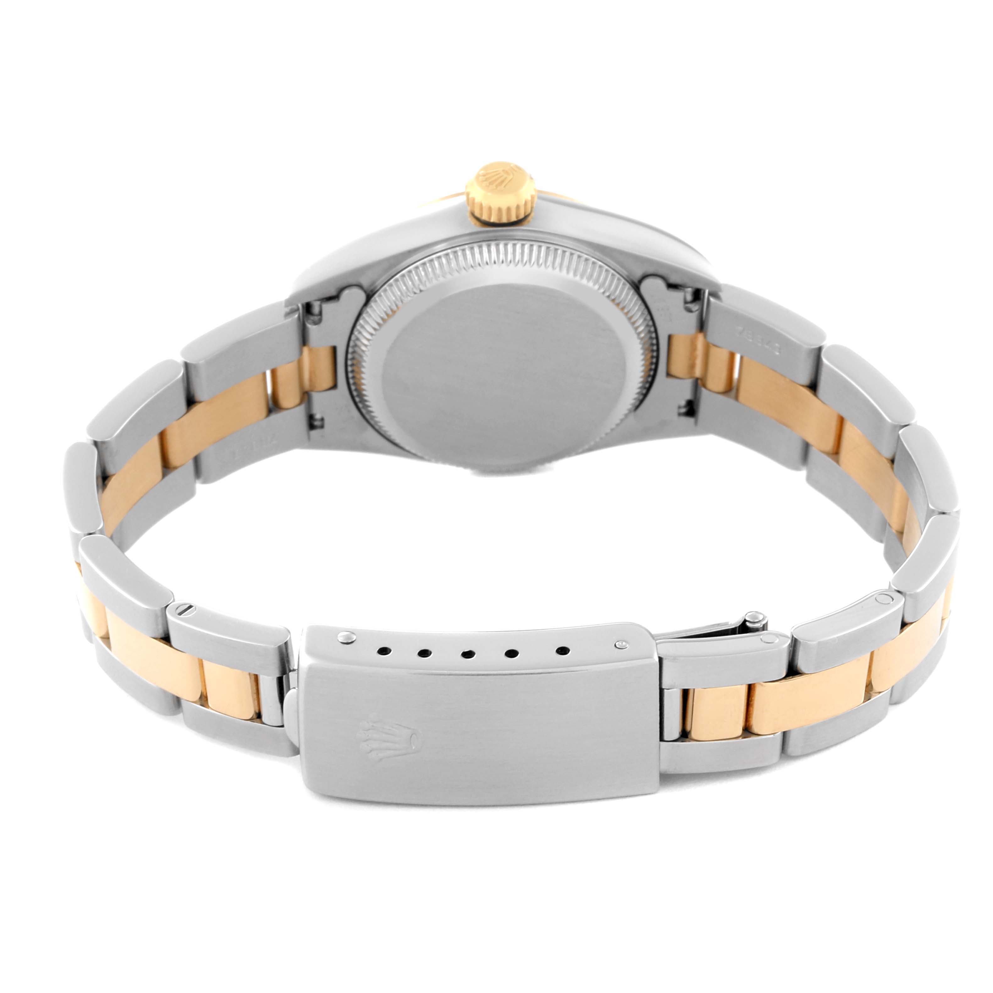 The image shows the back view of a Rolex Oyster Perpetual 67183 Women's Steel and Gold (two tone) Blue Dial 67183 Women's Steel and Gold (two tone) Blue Dial watch, highlighting the case back and two-tone bracelet with the clasp.