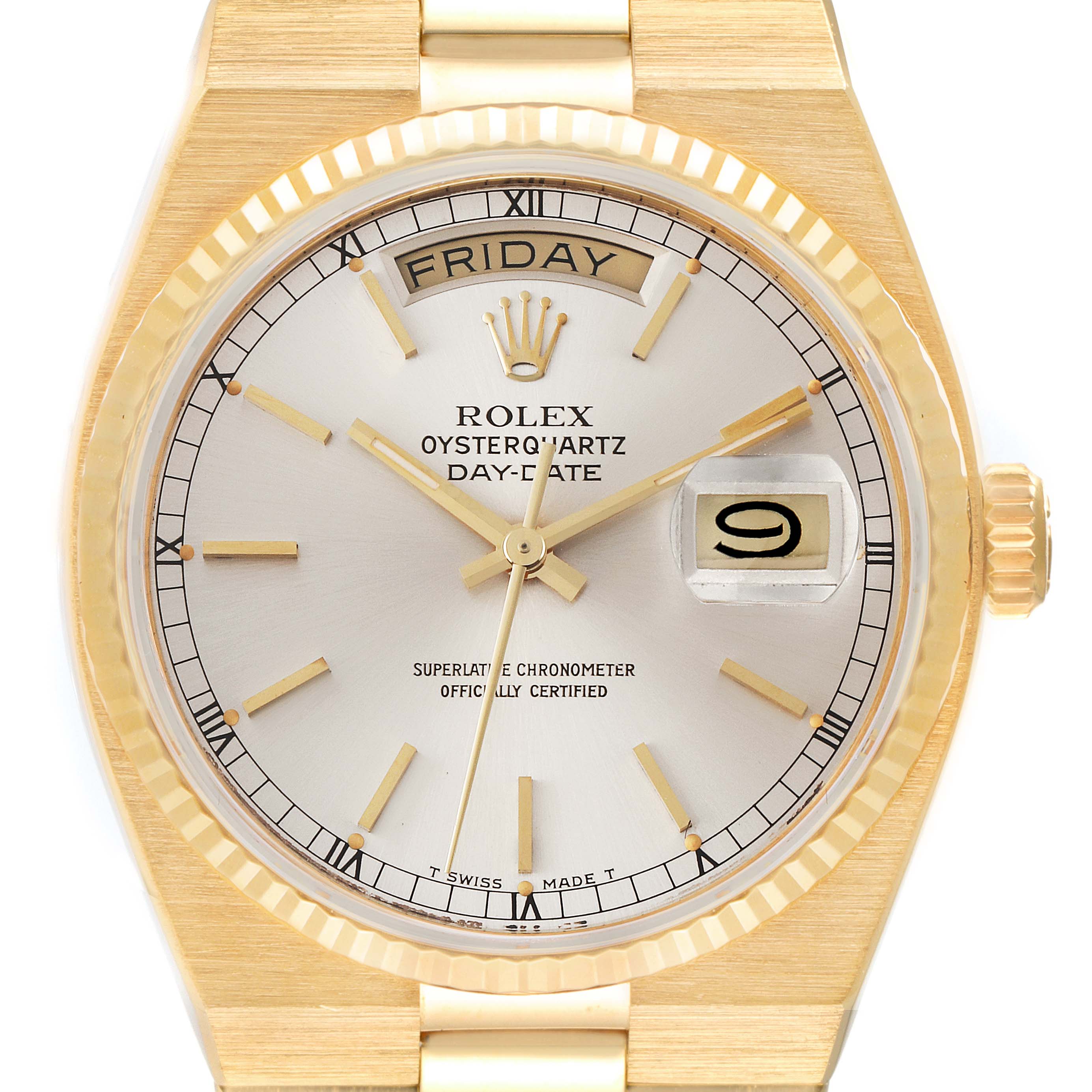 This image shows a frontal view of a Rolex Oysterquartz 19018 Men's Yellow Gold Silver Dial 19018 Men's Yellow Gold Silver Dial Day-Date watch, featuring its dial, hands, and day-date display.