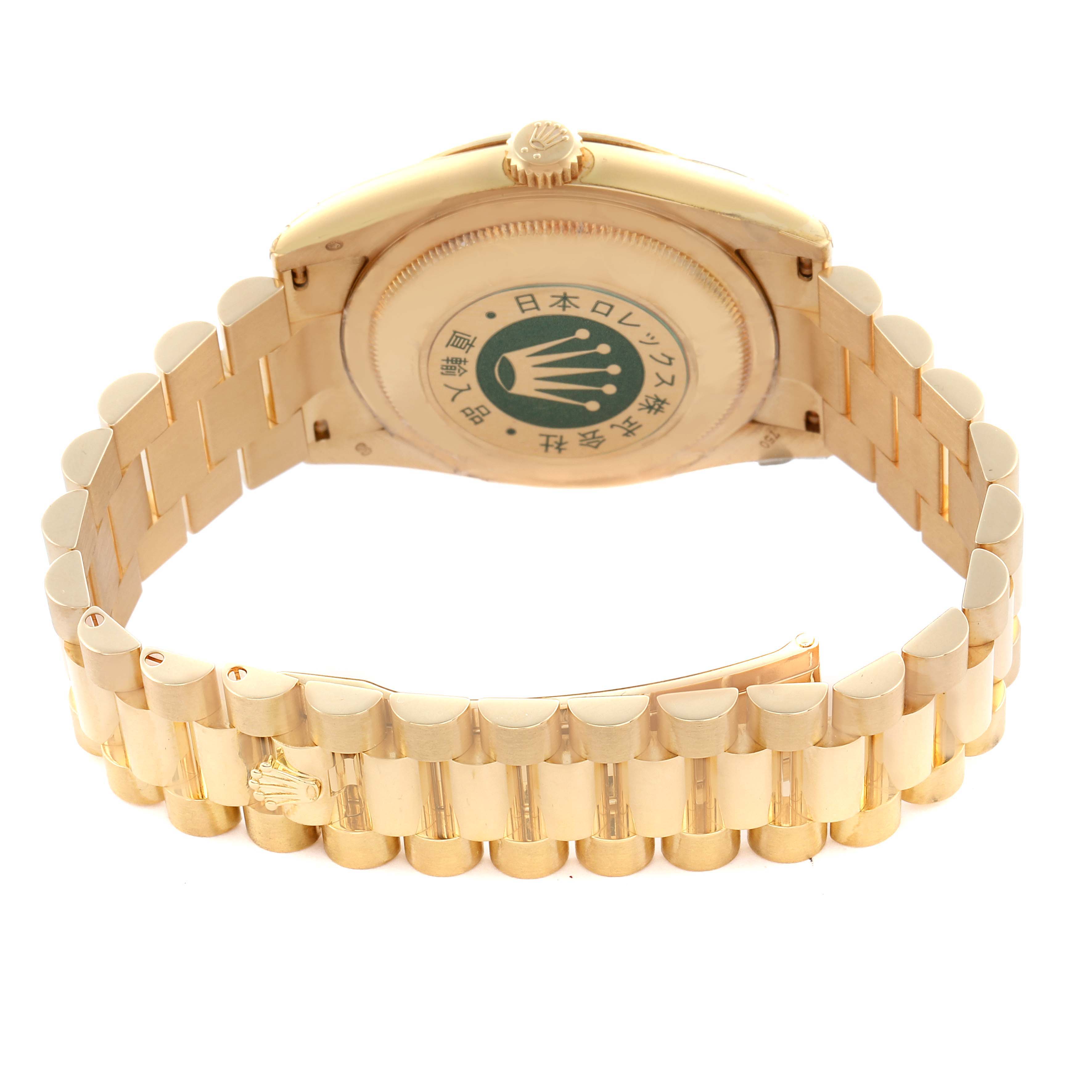 The Rolex President 118238 Men
s Yellow Gold Champagne Dial 118238 Men
s Yellow Gold Champagne Dial model is shown from the back, highlighting the bracelet and case back with visible emblem.