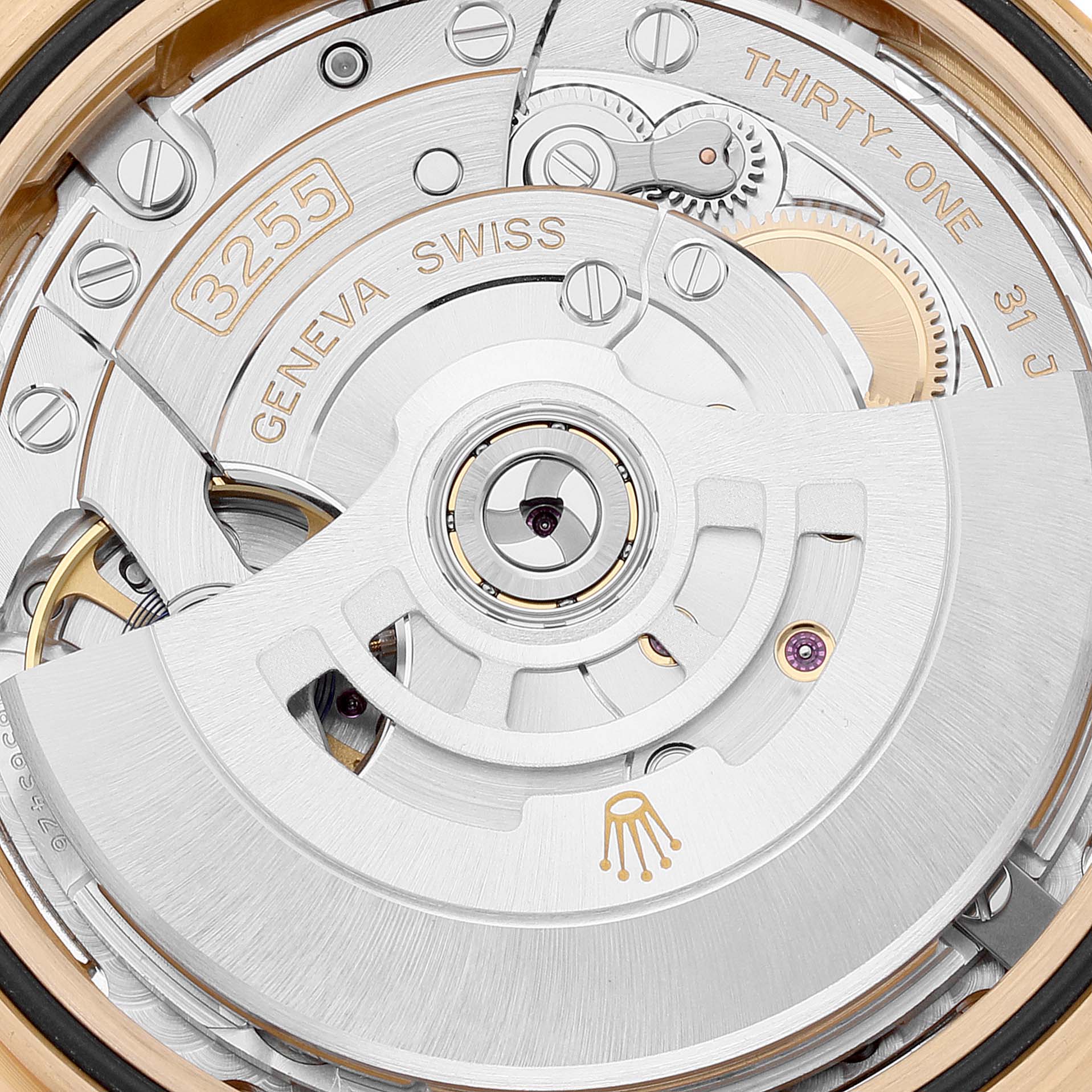 This image shows the intricate inner mechanism of the Rolex President 228238 Men's Yellow Gold Silver Dial 228238 Men's Yellow Gold Silver Dial model, highlighting the movement and rotor components.