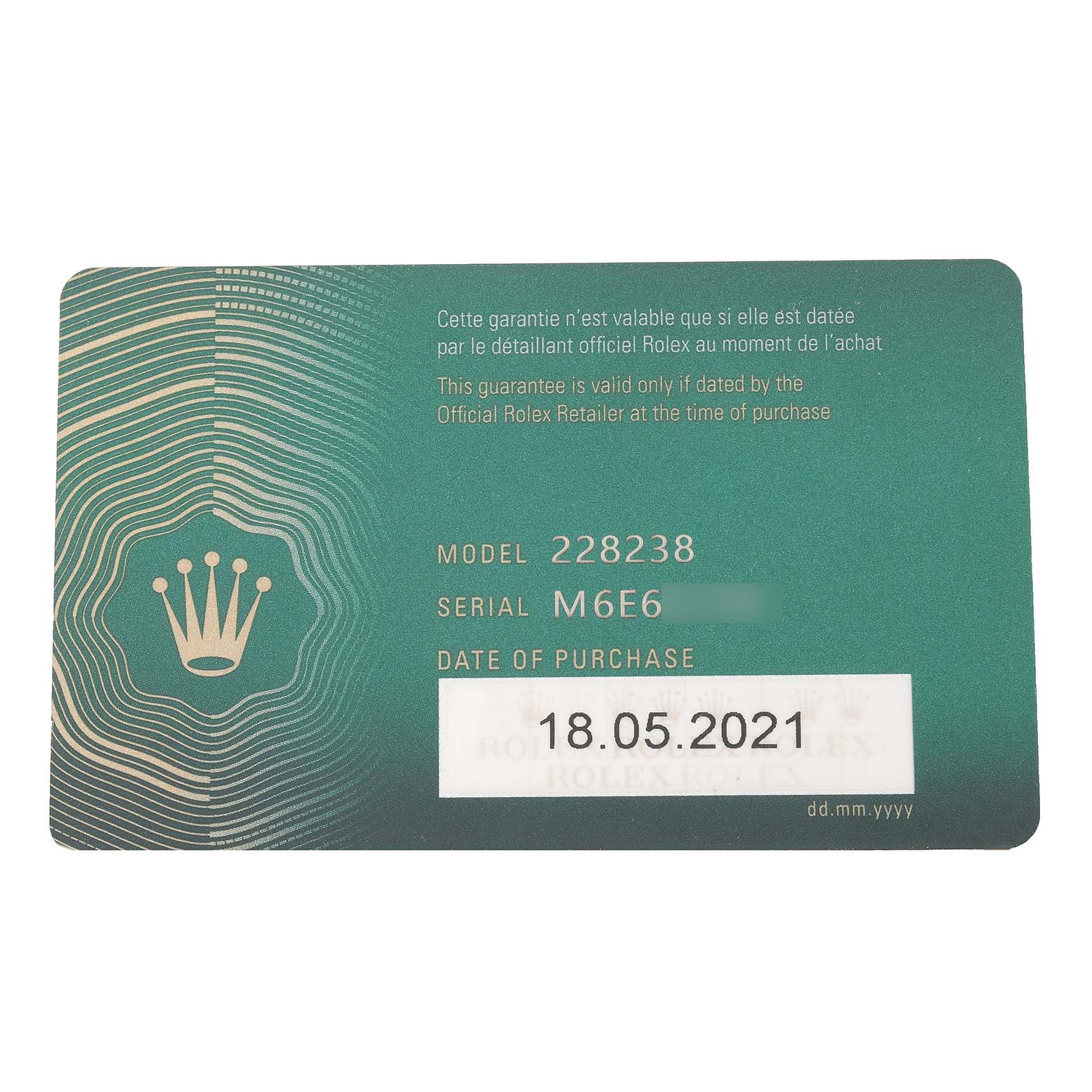 This image shows the warranty card for a Rolex President 228238 Men's Yellow Gold Silver Dial 228238 Men's Yellow Gold Silver Dial model watch, displaying the model number, serial number, and date of purchase.