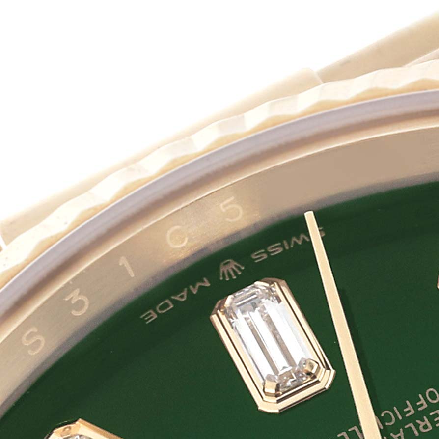 Close-up view of the Rolex President 128238 Men
s Yellow Gold Green Dial 128238 Men
s Yellow Gold Green Dial model showing a portion of the bezel, dial with diamond markers, and hands.